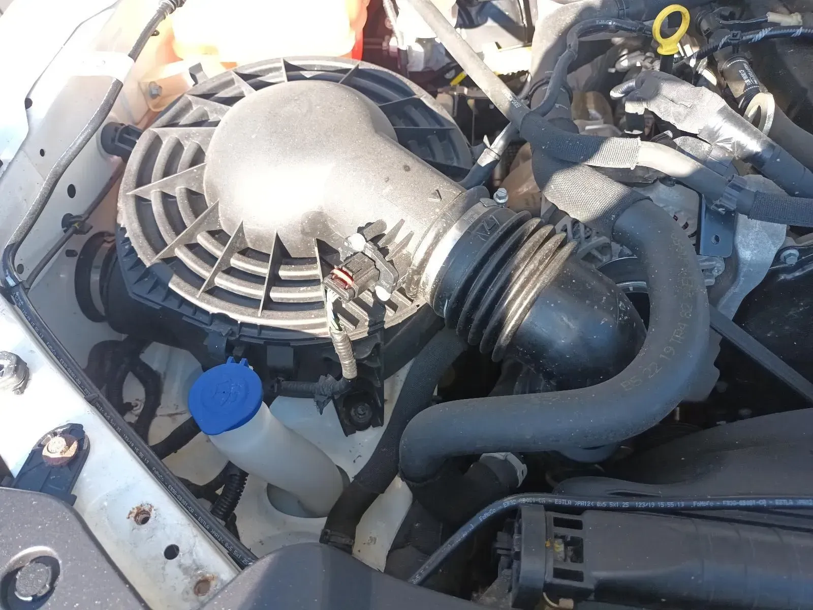 Car Engine Bay, Air Intake System, White Car, Blue Washer Fluid Cap — South West 4WD Wreckers In Brisbane, QLD