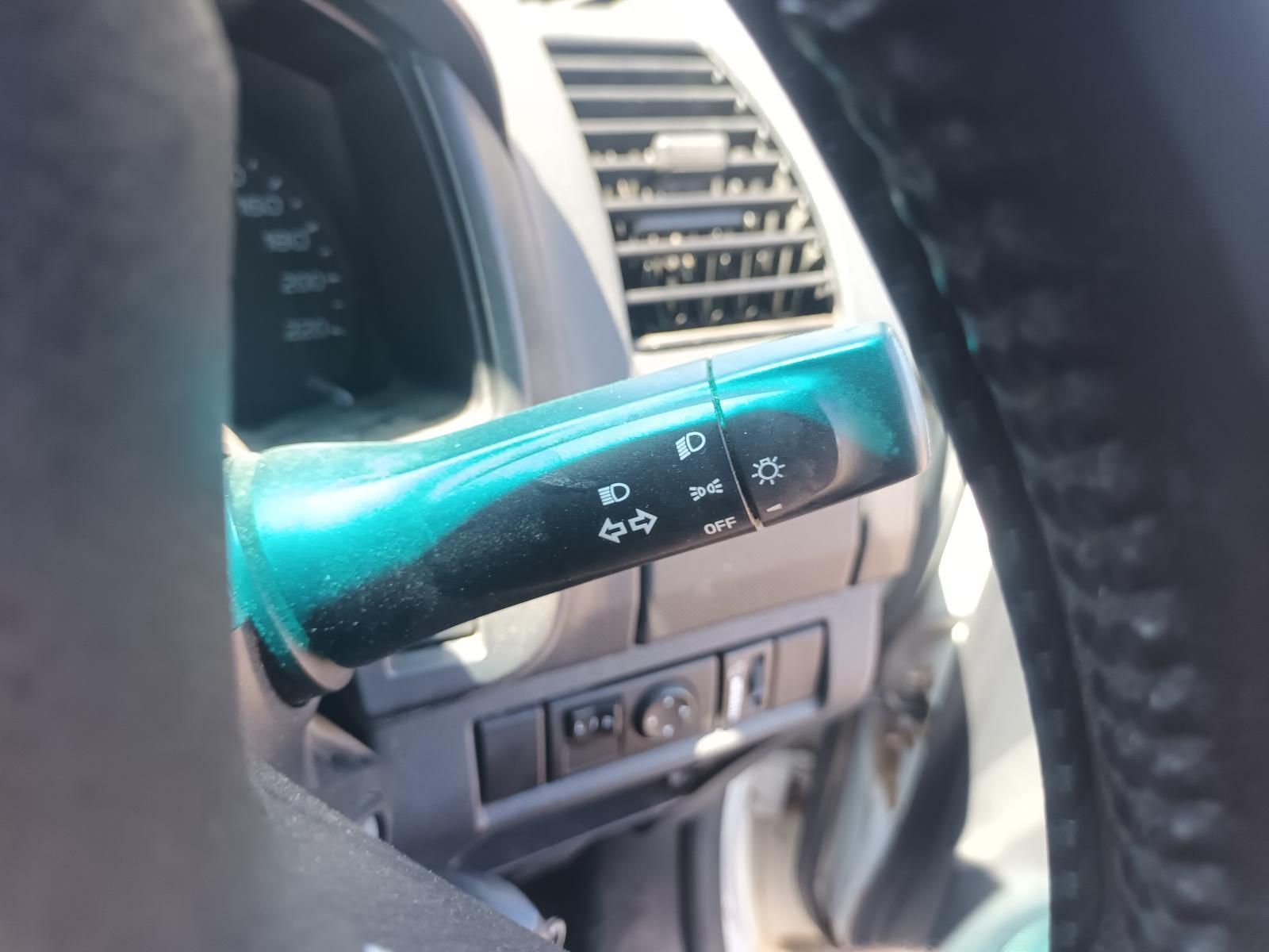 A Close Up of a Car Dashboard With a Blue Switch — South West 4WD Wreckers In Brisbane, QLD