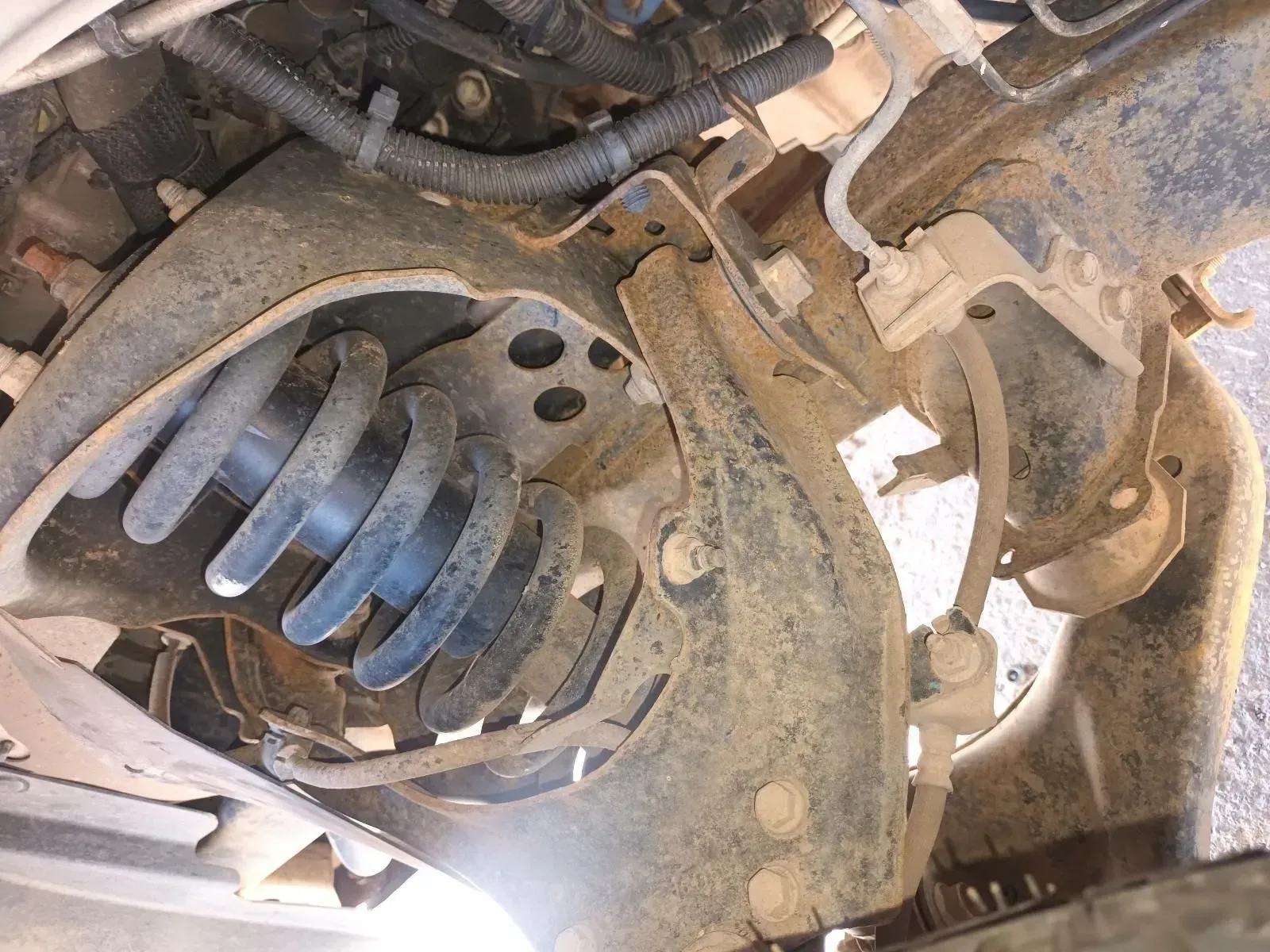 Suspension Coil Spring on a Vehicle's Undercarriage — South West 4WD Wreckers In Brisbane, QLD