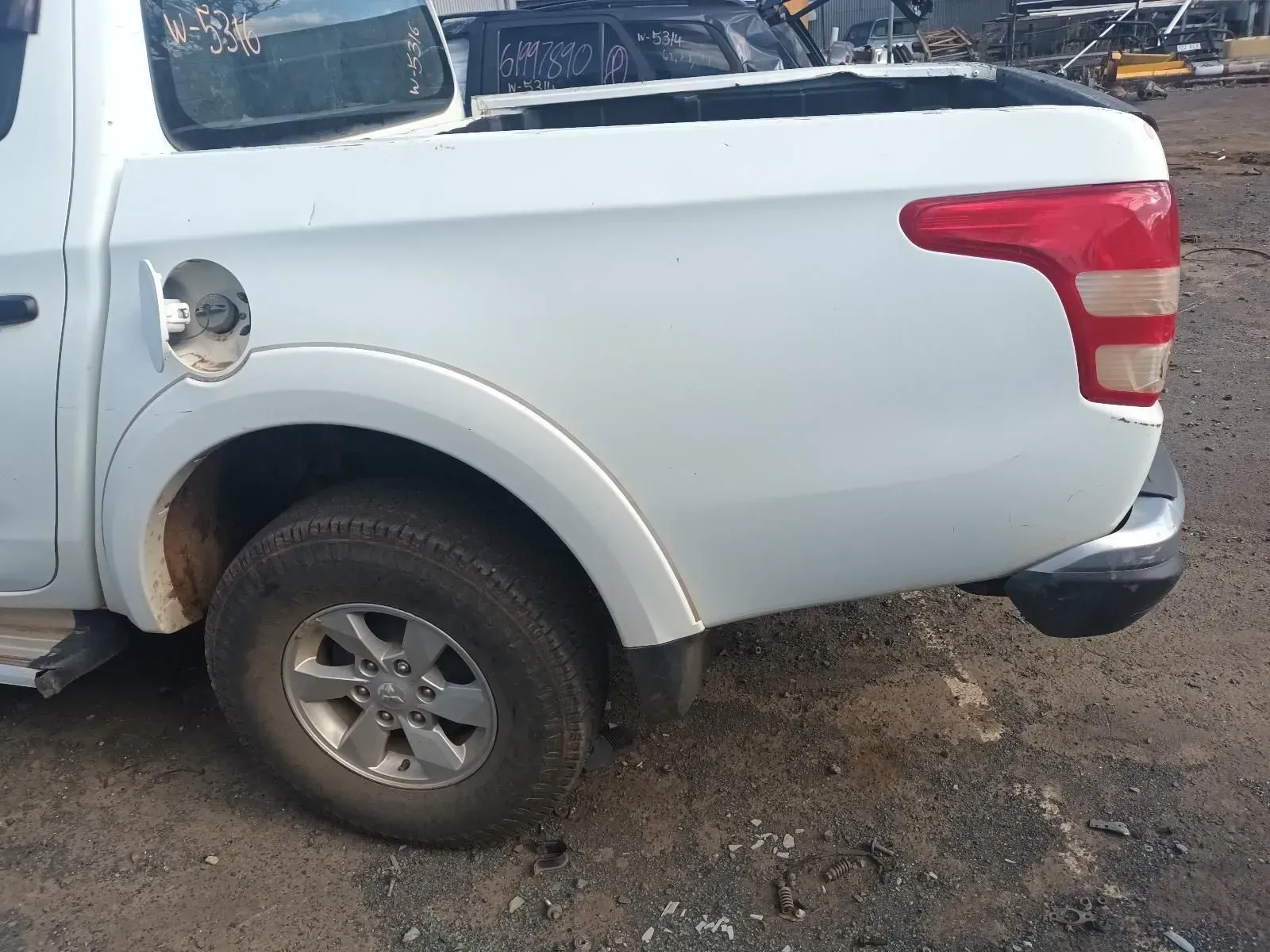 White Pickup Truck Rear Quarter Panel, Including Tyre and Tail Light — South West 4WD Wreckers In Brisbane, QLD