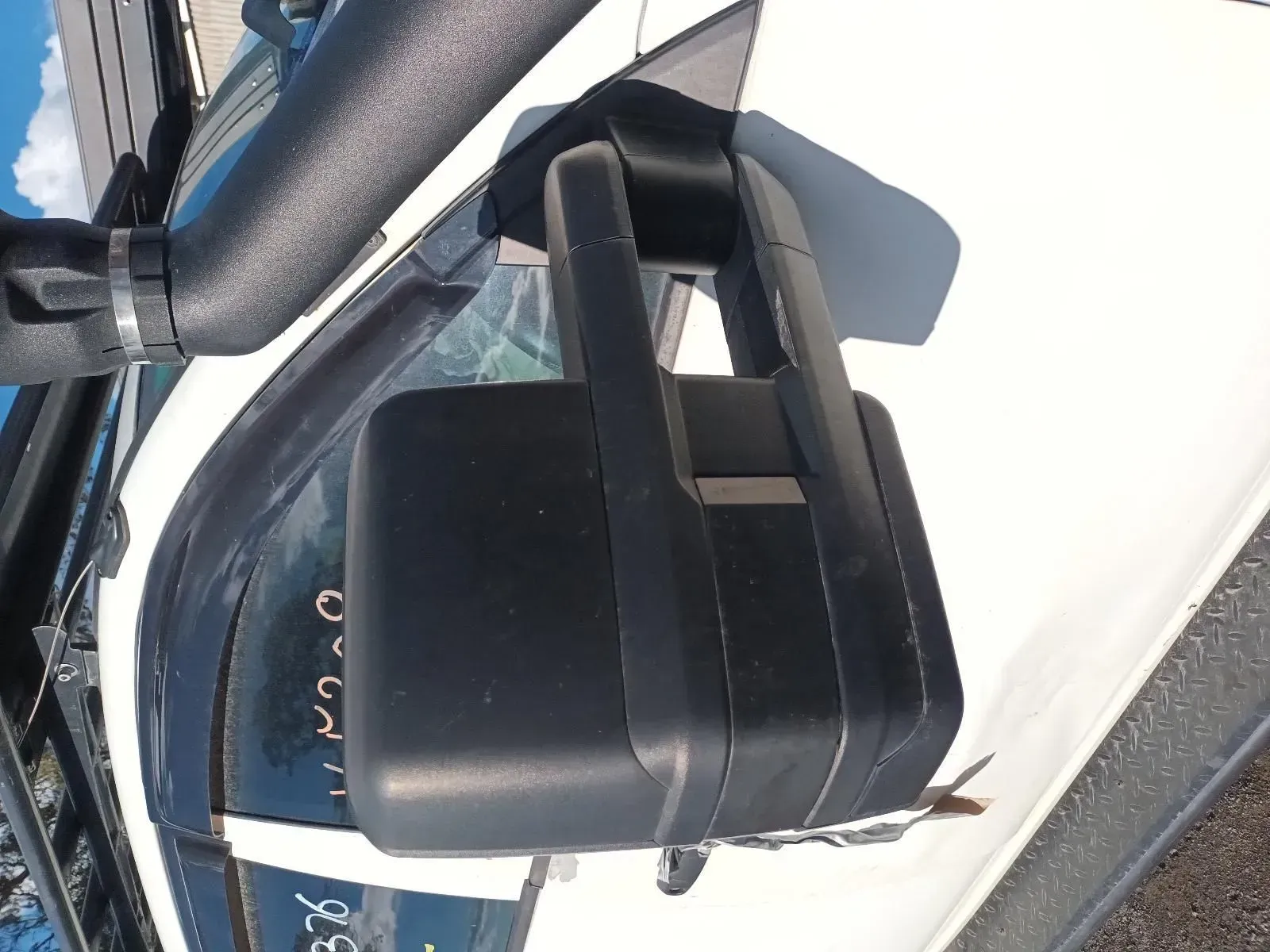 Black Side View Mirror on a White Vehicle, With a Black Snorkel Visible — South West 4WD Wreckers In Brisbane, QLD