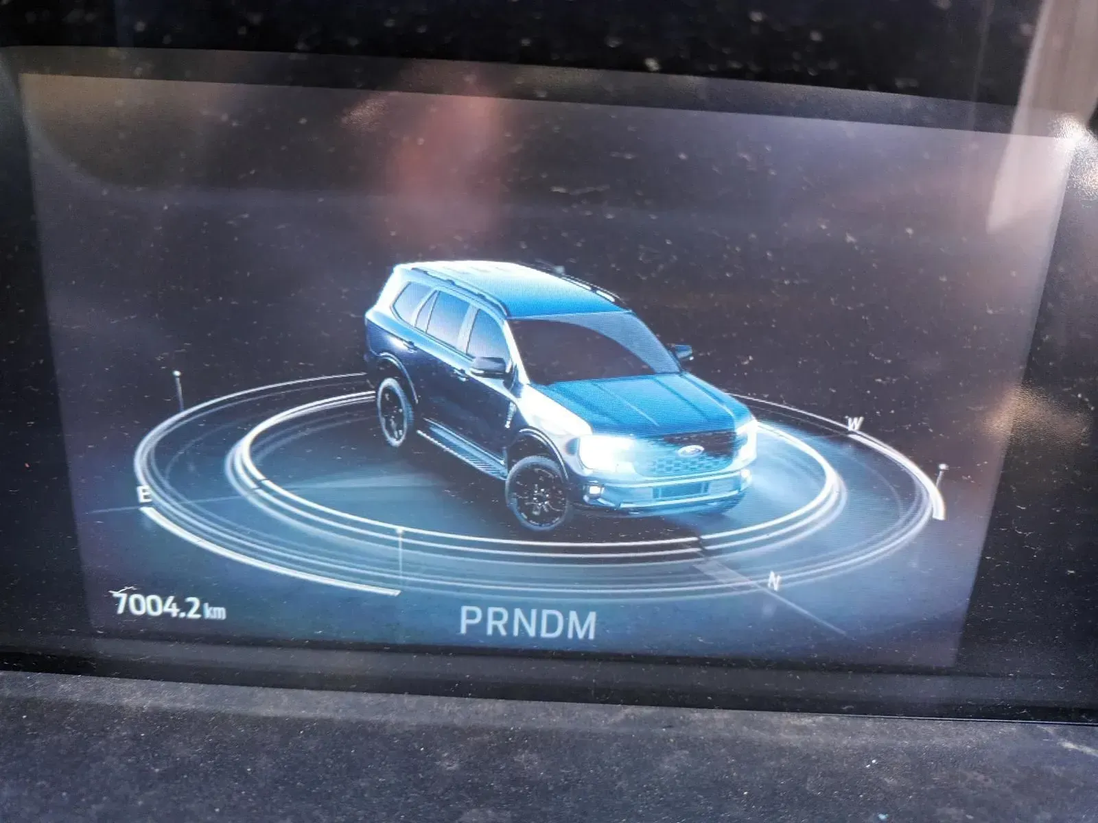 Car Dashboard Displaying a Blue Suv on a Circular Graphic — South West 4WD Wreckers In Brisbane, QLD