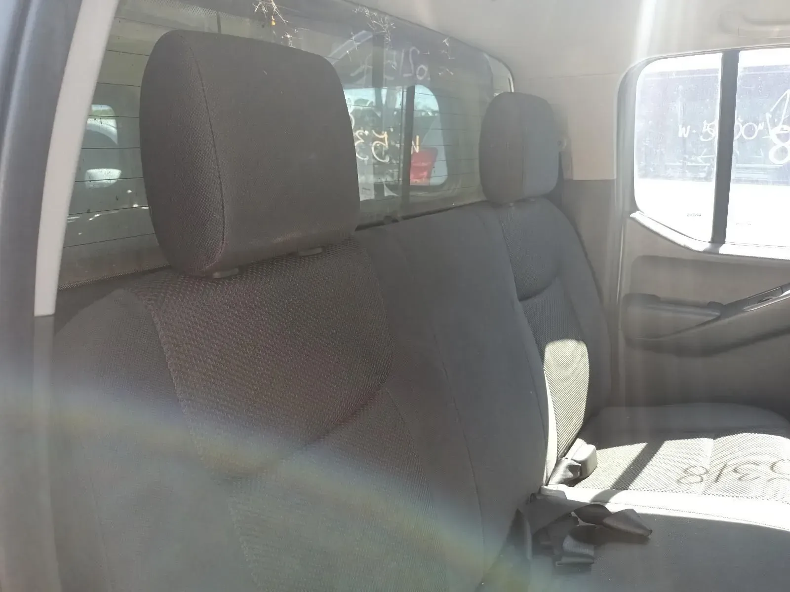 Interior of a Gray Truck Cab With Headrests, Seats, and a Window — South West 4WD Wreckers In Brisbane, QLD