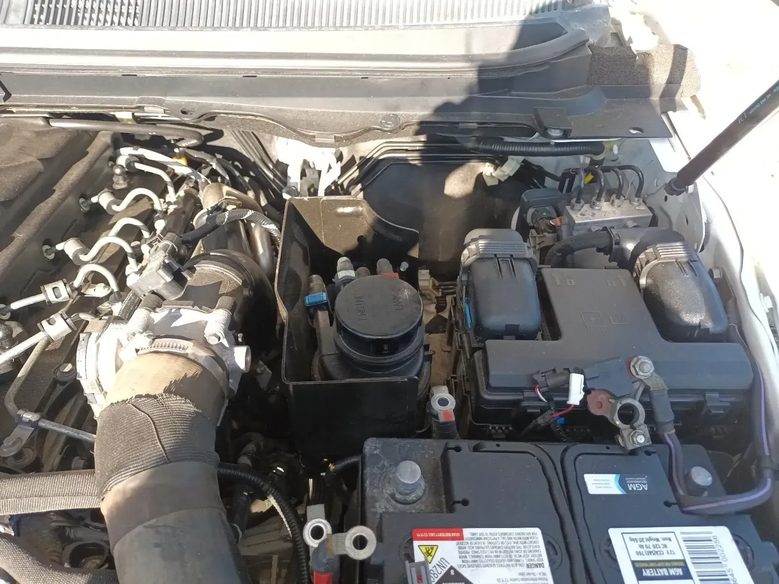 Car Engine Bay, Including Battery, Various Components, and Hoses — South West 4WD Wreckers In Brisbane, QLD