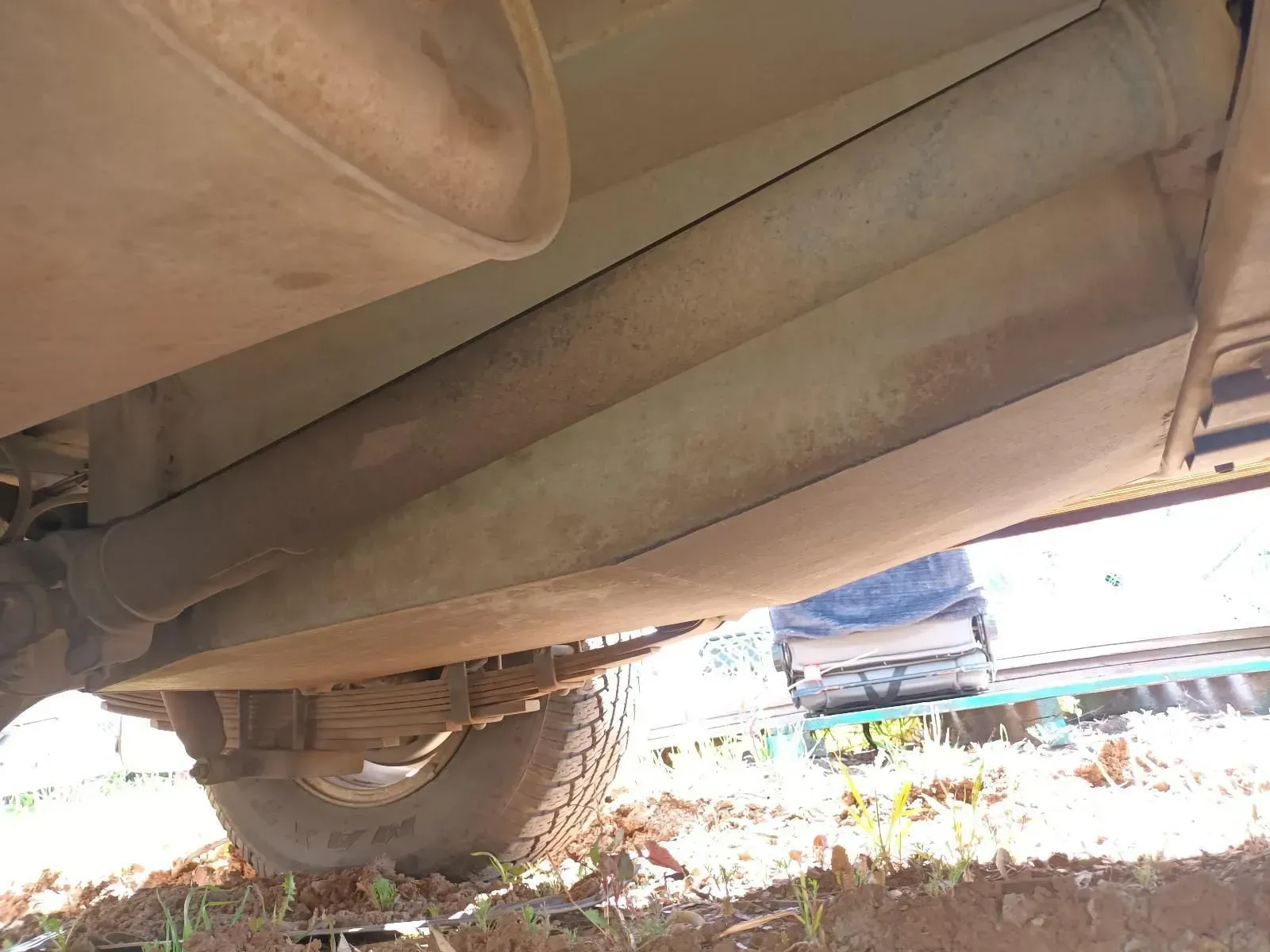 Underside of a Vehicle Showing Exhaust System and Fuel Tank, Viewed From the Rear — South West 4WD Wreckers In Brisbane, QLD