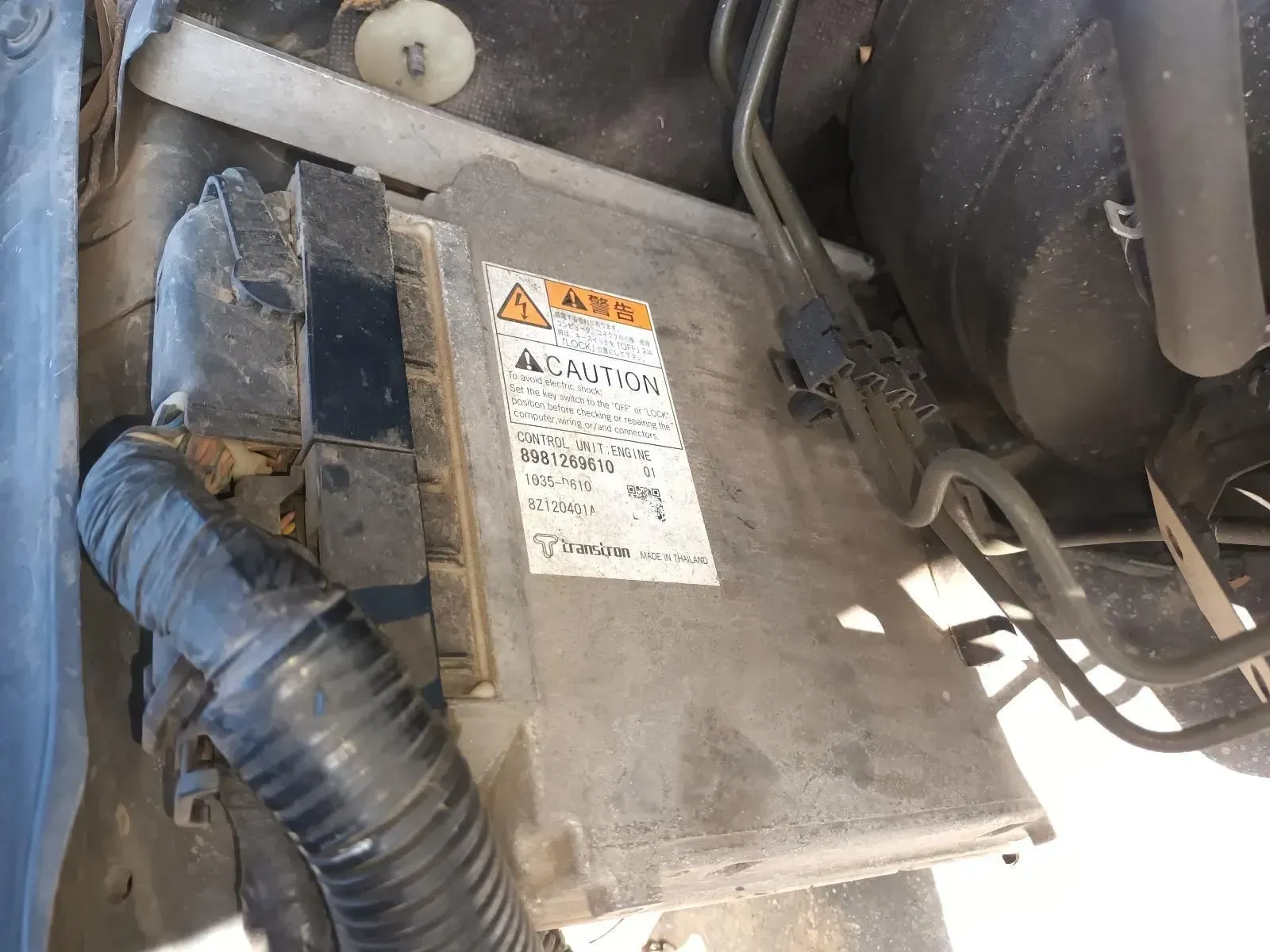 Close-up of a Car Engine Computer Control Module — South West 4WD Wreckers In Brisbane, QLD