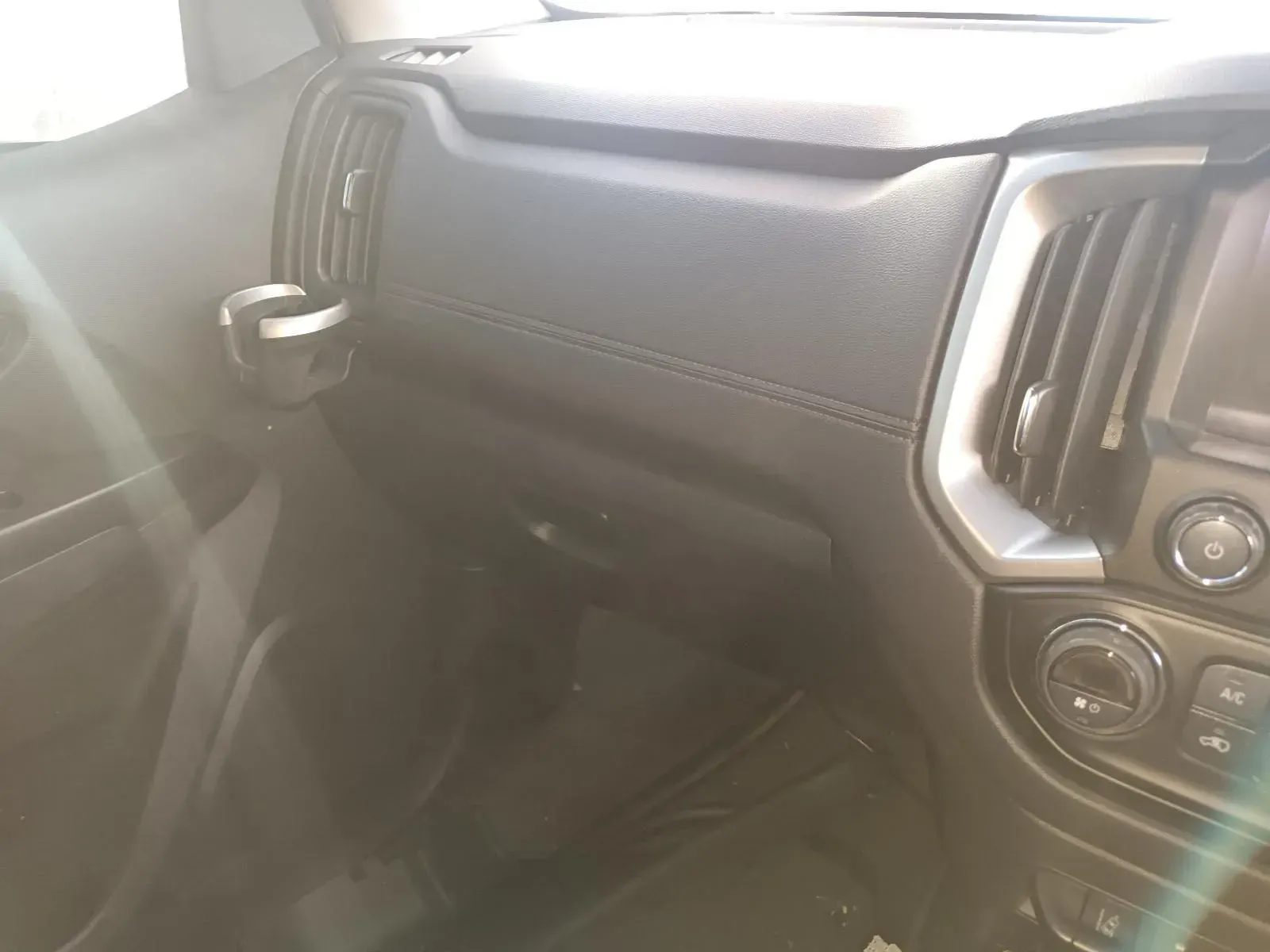 Car Interior Dashboard View With Black Features, Air Vents, and a Cup Holder — South West 4WD Wreckers In Brisbane, QLD