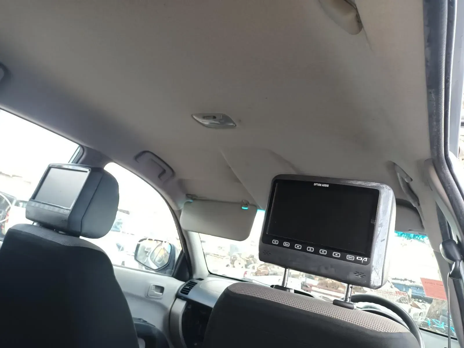 Interior of a Car With Two Headrest-mounted Entertainment Screens — South West 4WD Wreckers In Brisbane, QLD