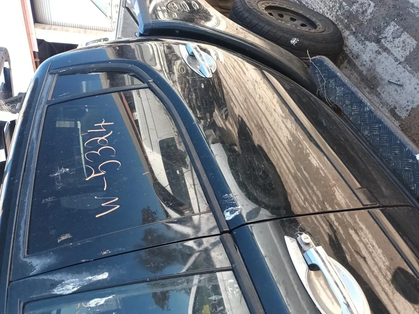 Black Car Part With the Numbers — South West 4WD Wreckers In Brisbane, QLD