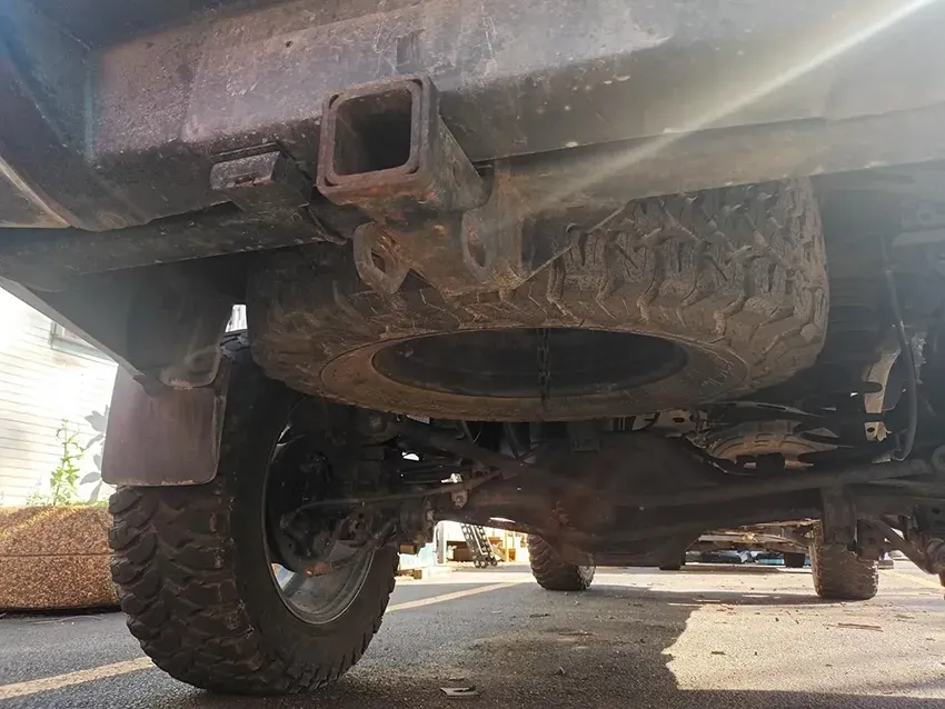 A Close Up of the Underside of a Truck Parked on the Side of the Road — South West 4WD Wreckers In Brisbane, QLD