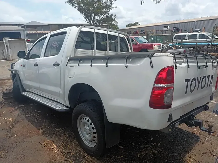 A White Toyota Truck is Parked in a Parking Lot — South West 4WD Wreckers In Brisbane, QLD