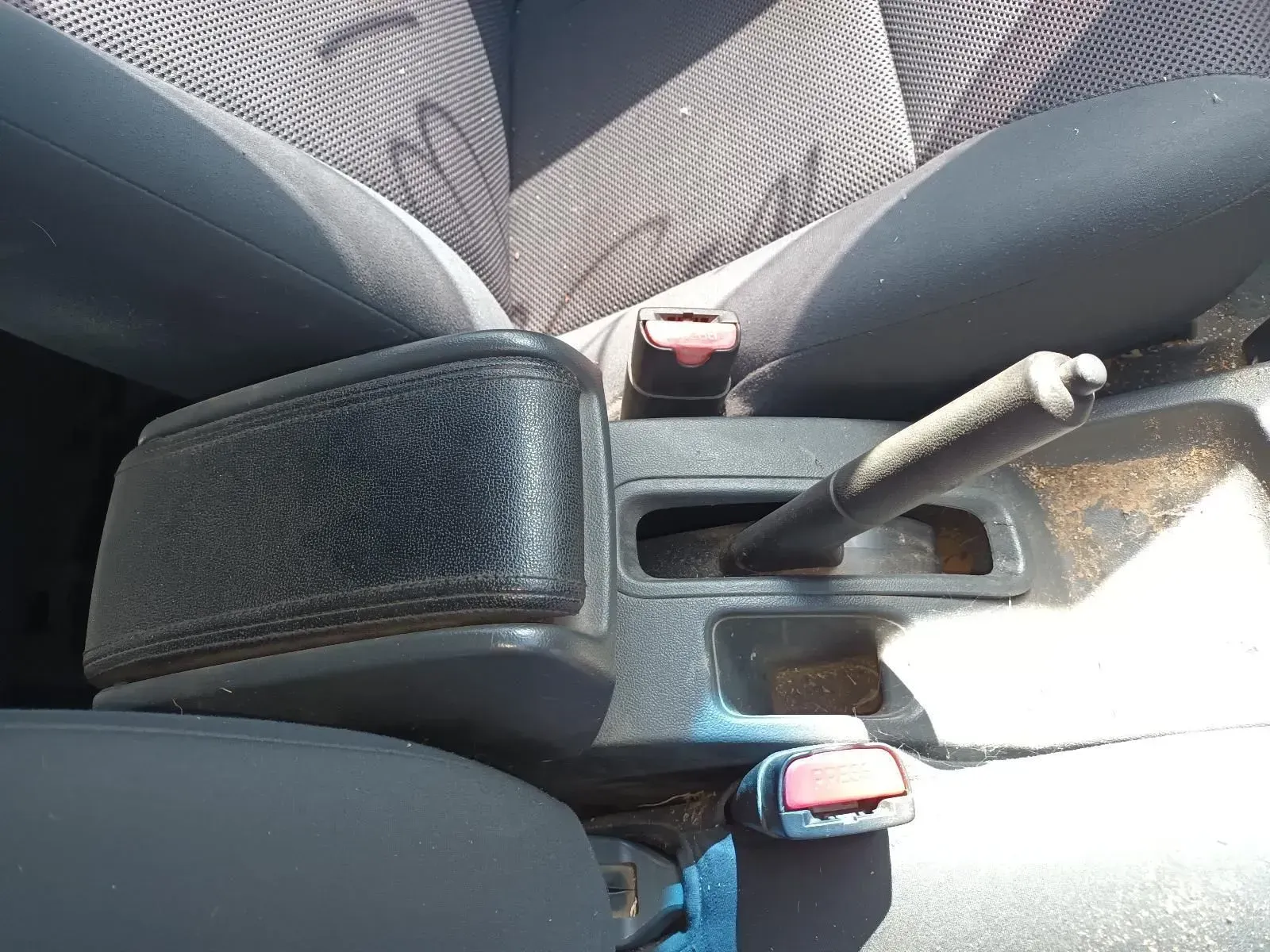 Interior Car Console With Armrest, Seatbelts, and Handbrake — South West 4WD Wreckers In Brisbane, QLD