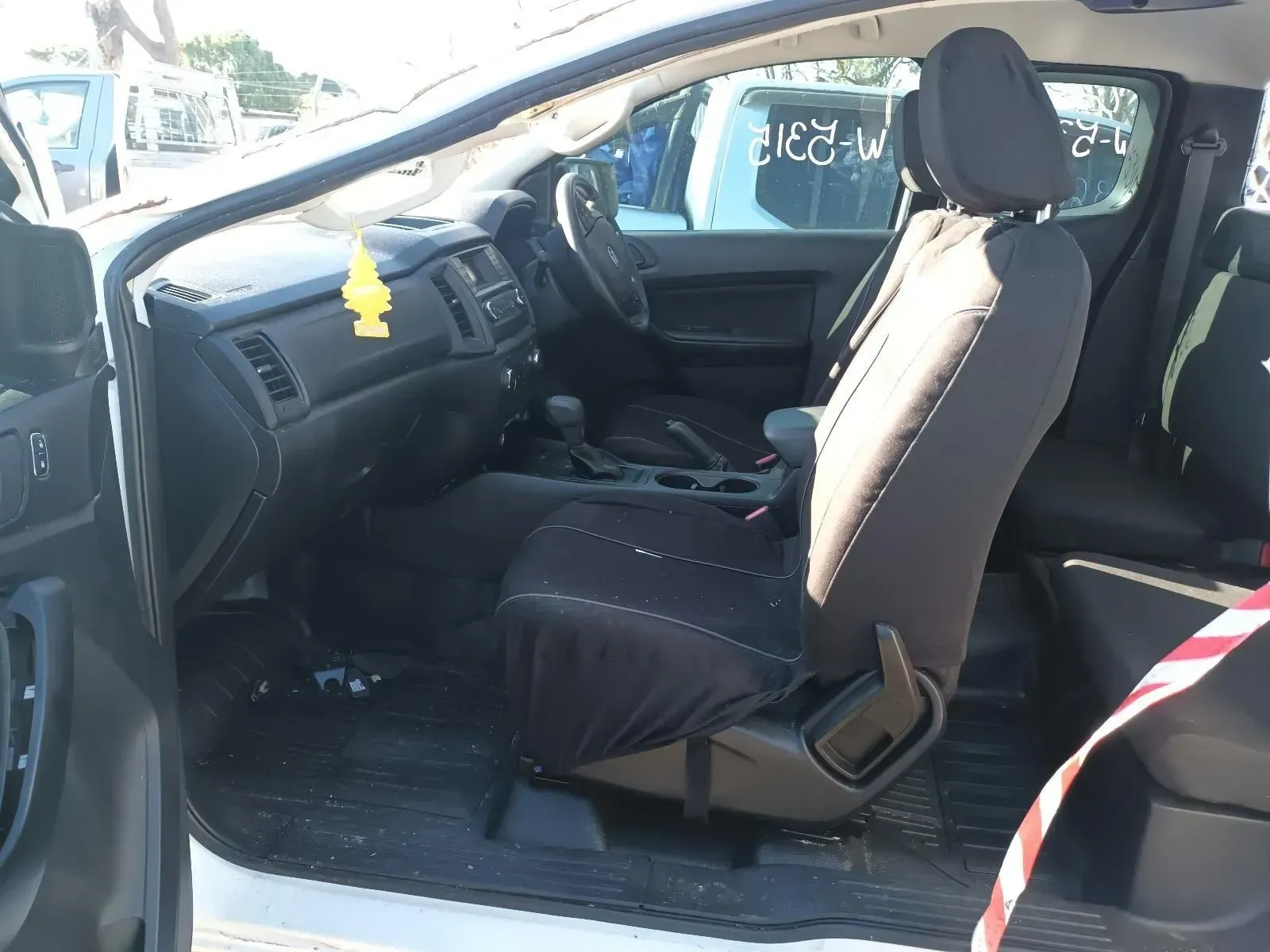 White Pickup Truck Interior With Black Seats — South West 4WD Wreckers In Brisbane, QLD