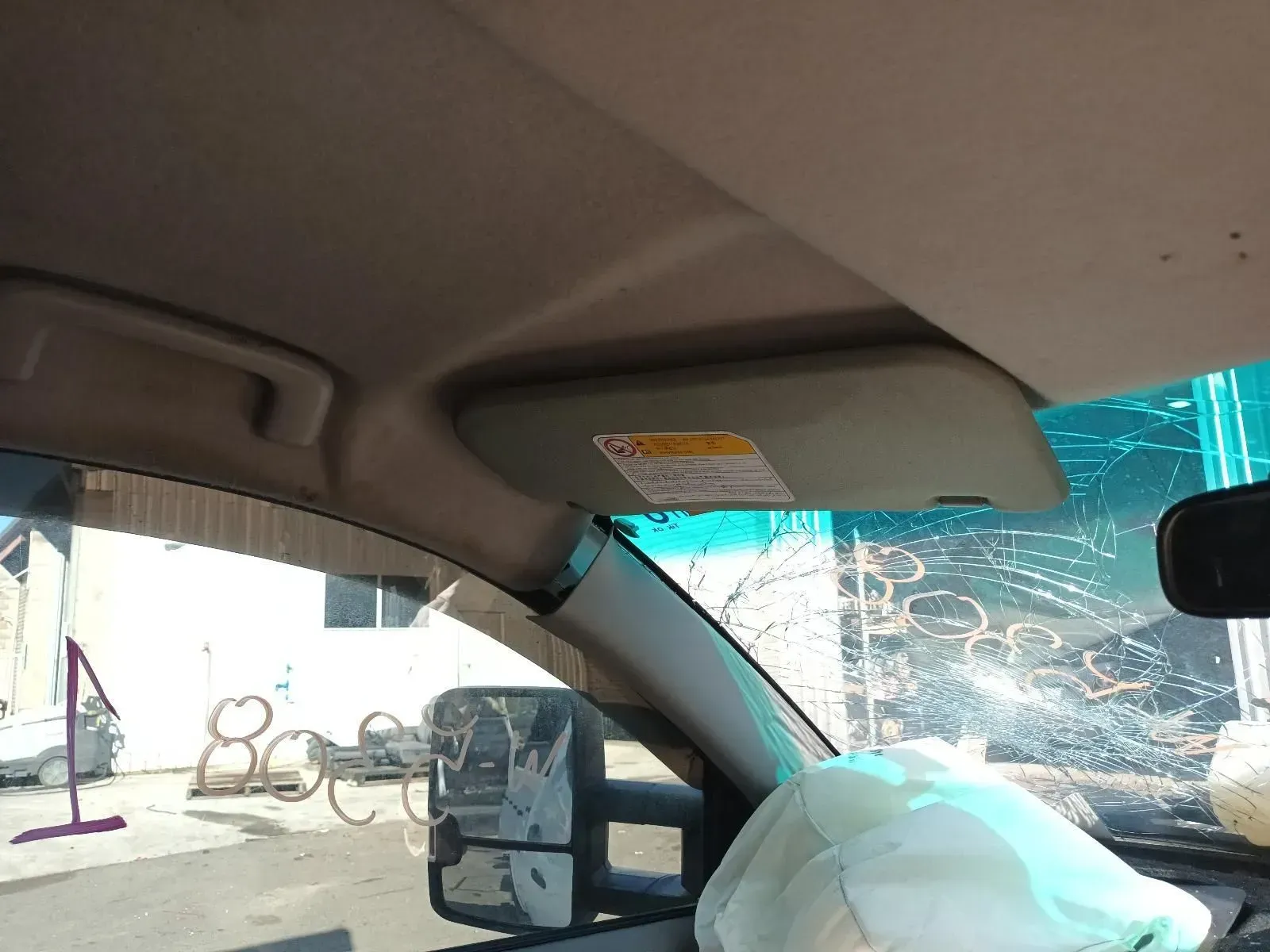 Interior View of a Car's Sun Visor, Windshield, and Side Mirror — South West 4WD Wreckers In Brisbane, QLD