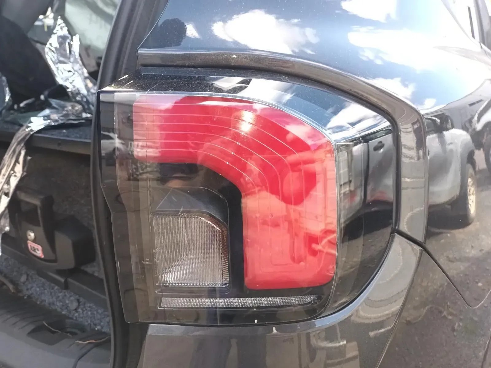 Black SUV Tail Light With Red and Clear Lens — South West 4WD Wreckers In Brisbane, QLD