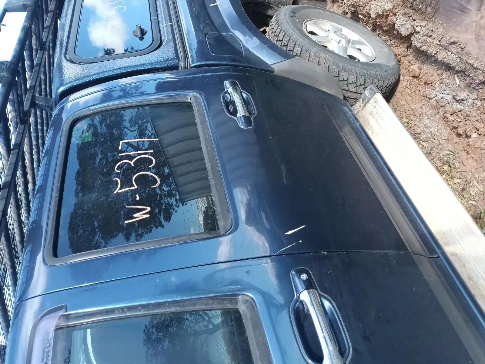 Blue Truck Bed With a Window, Side Handle and the Number — South West 4WD Wreckers In Brisbane, QLD