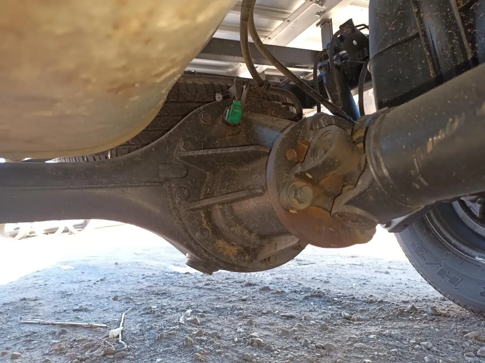 Underside View of a Vehicle's Rear Axle, With a Rusted Driveshaft and Differential — South West 4WD Wreckers In Brisbane, QLD