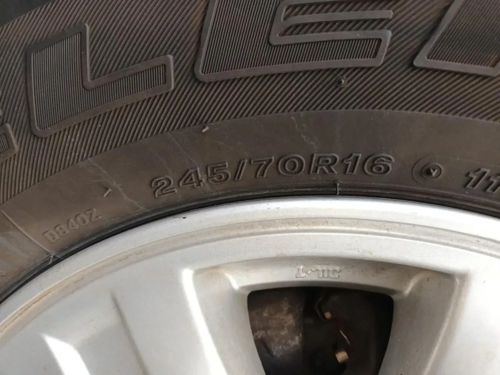 Close-up of a Tyre Showing the Size Information: 245/70r16 — South West 4WD Wreckers In Brisbane, QLD