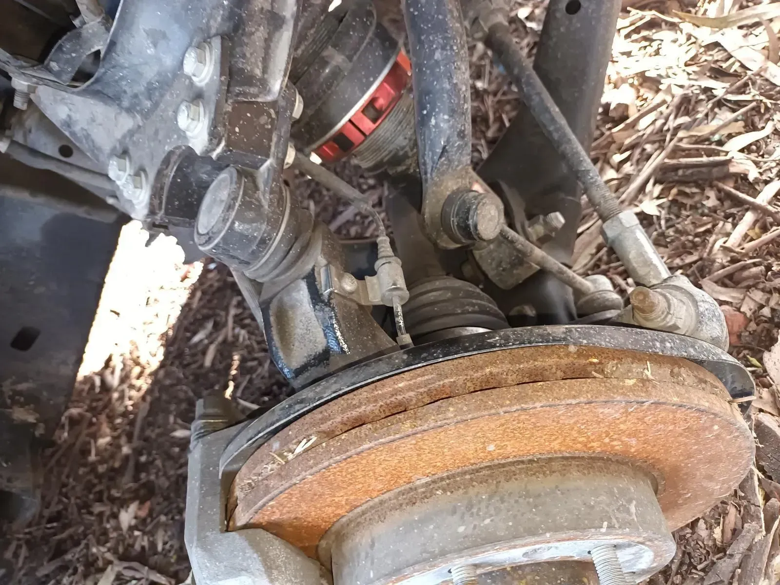 Rusty Car Brake Rotor and Suspension Components — South West 4WD Wreckers In Brisbane, QLD