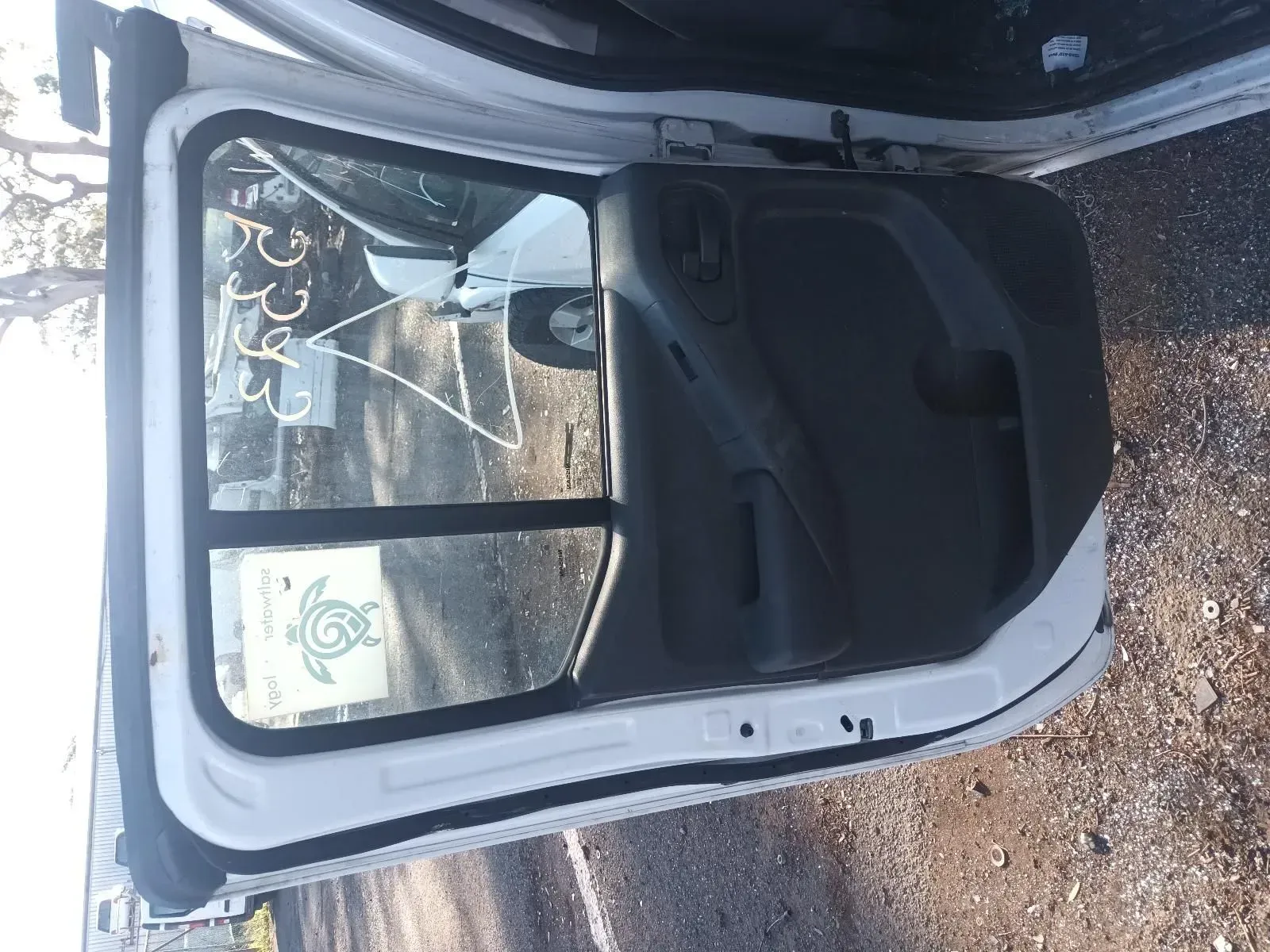 White Car Door, Open, Showing Interior Details, in a Junkyard — South West 4WD Wreckers In Brisbane, QLD