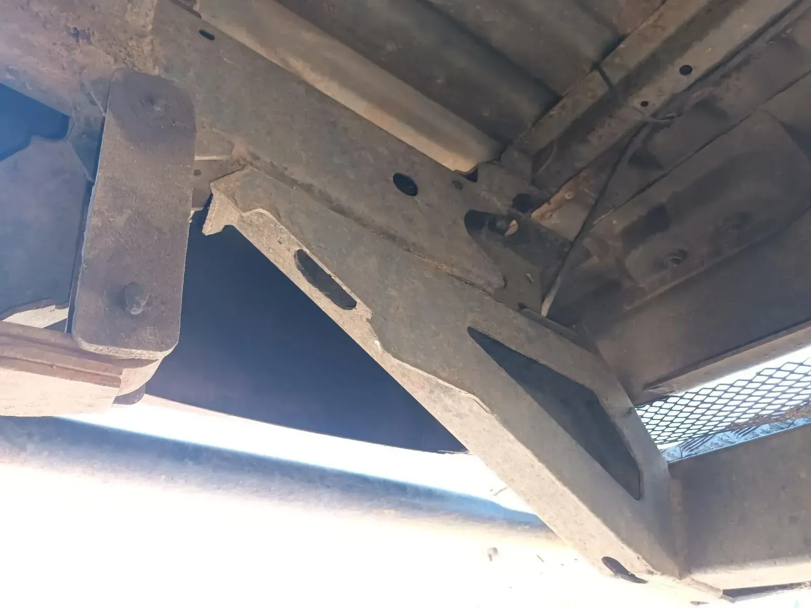 Underside of a Truck Bed With a Metal Support Bracket and Rust — South West 4WD Wreckers In Brisbane, QLD