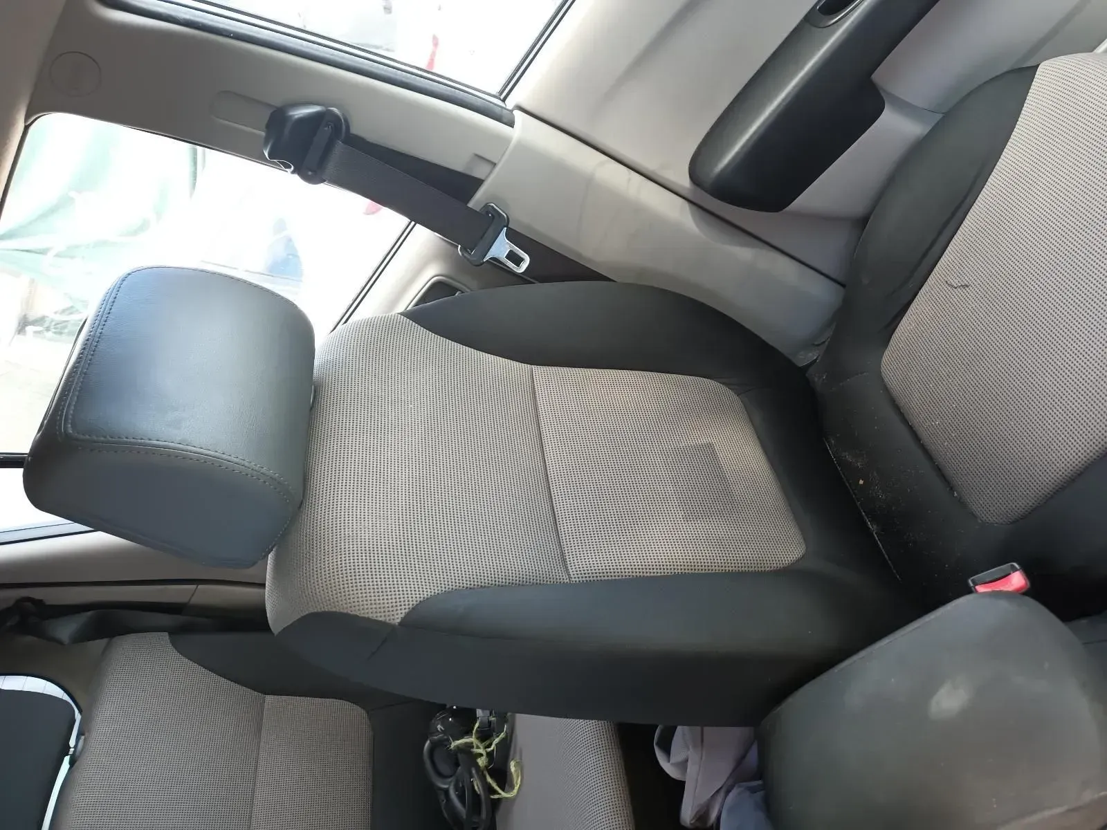 Interior of a Car With Gray and Black Patterned Seats and a Seatbelt Fastened — South West 4WD Wreckers In Brisbane, QLD