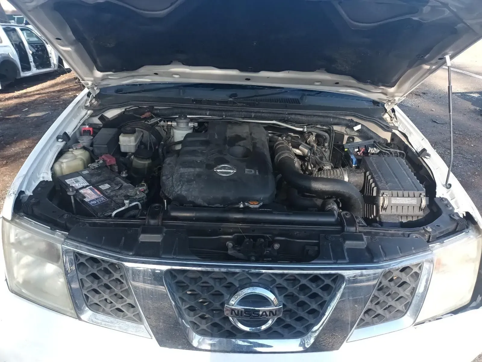 Nissan Truck Engine Bay With Open Hood, Revealing Engine Components — South West 4WD Wreckers In Brisbane, QLD
