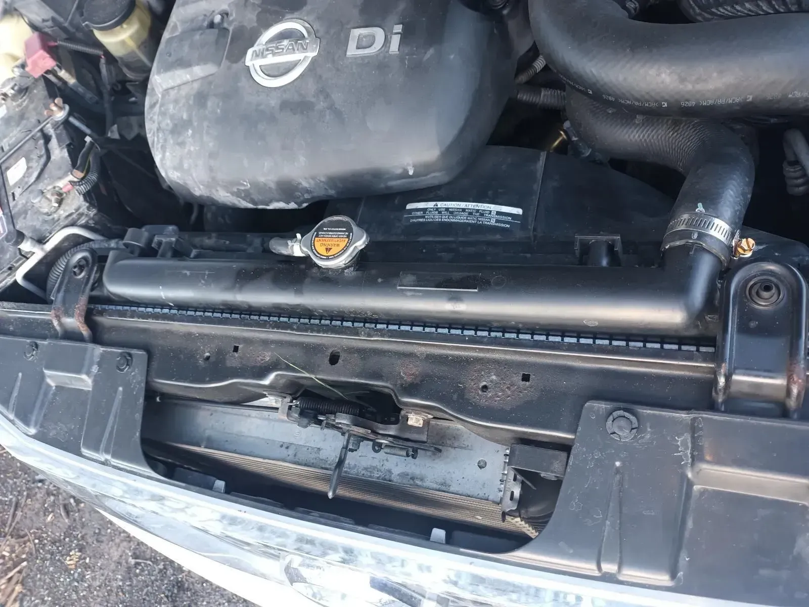 Nissan Engine Bay With Visible Radiator and Damage — South West 4WD Wreckers In Brisbane, QLD