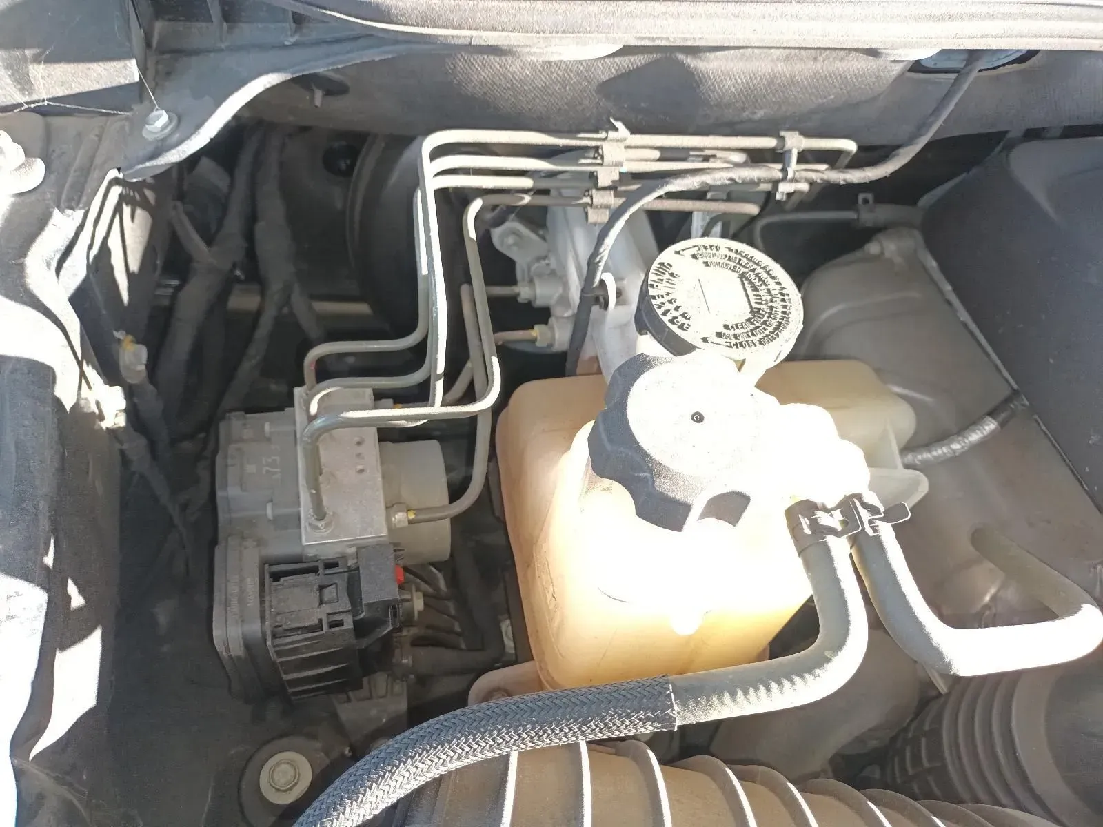 Engine Compartment With Brake Lines, Reservoir, and ABS Module — South West 4WD Wreckers In Brisbane, QLD