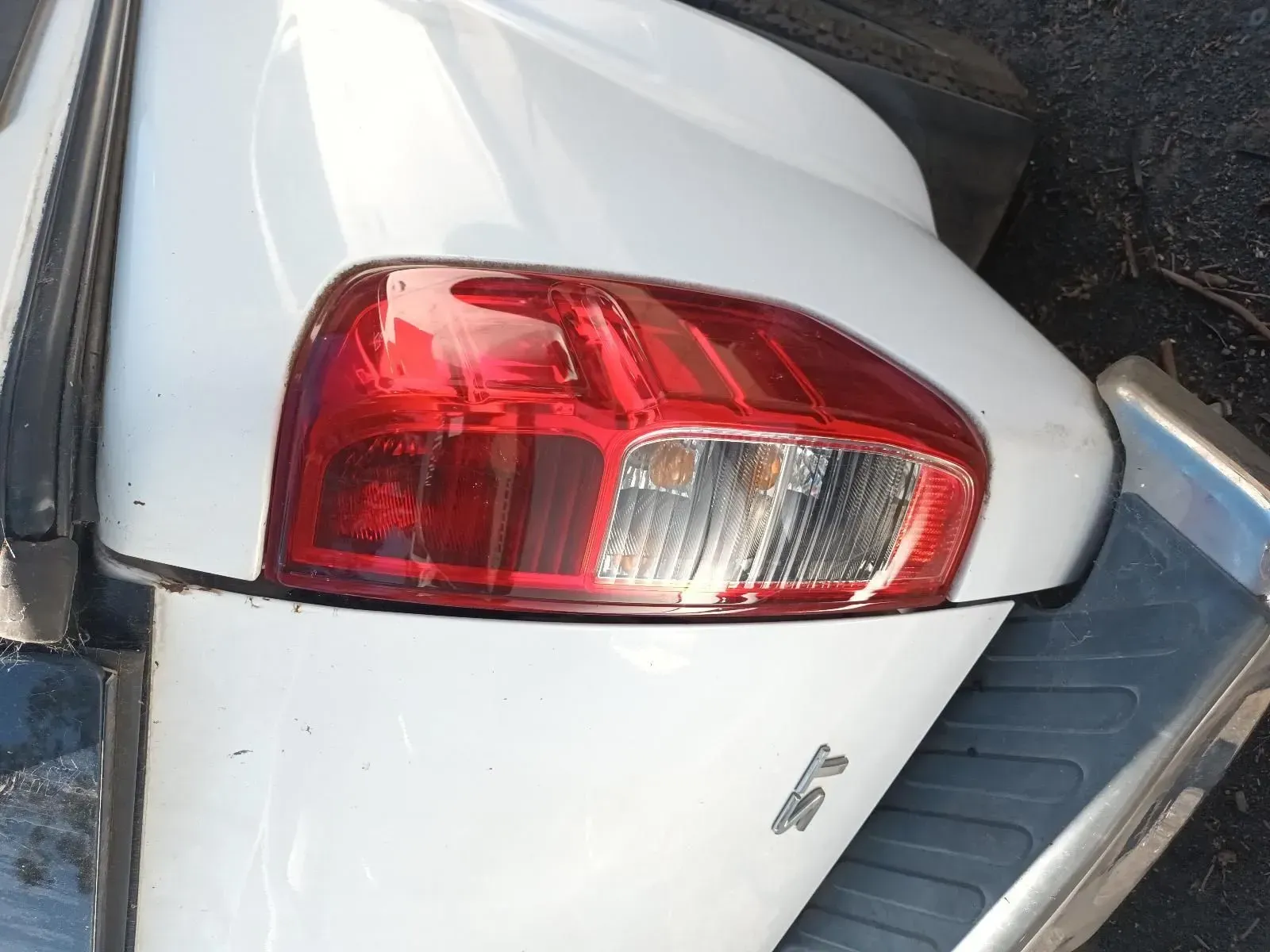 White Car's Rear End With a Red Taillight — South West 4WD Wreckers In Brisbane, QLD