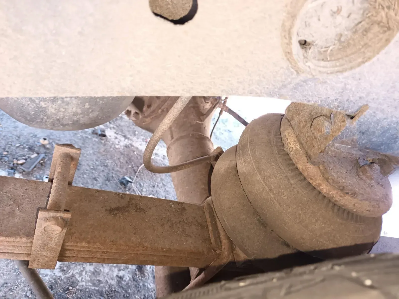 Rusty Truck Rear Suspension With Leaf Spring and Air Spring — South West 4WD Wreckers In Brisbane, QLD