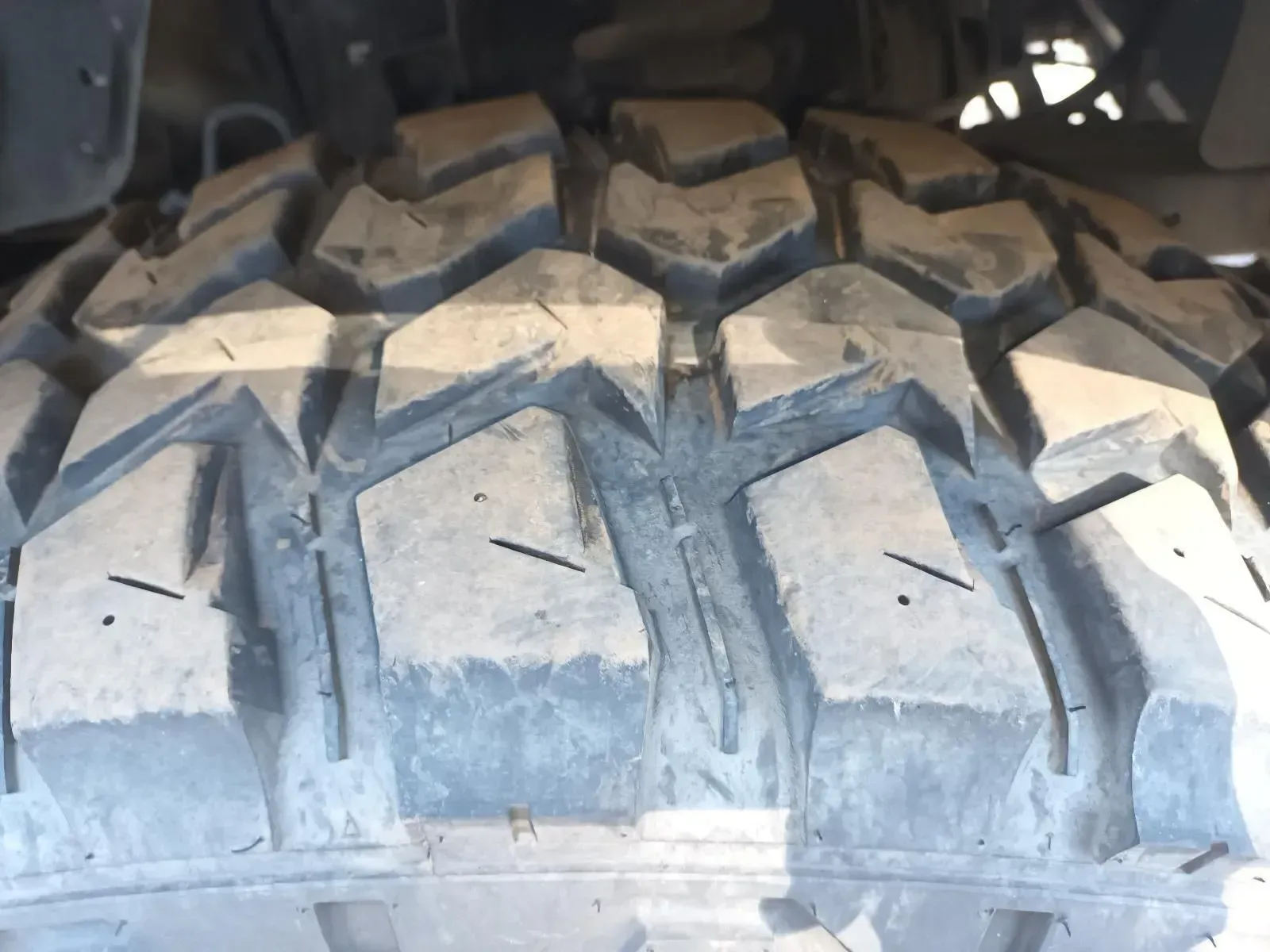 Close-up of a Black Off-road Tyre Tread With Deep Grooves — South West 4WD Wreckers In Brisbane, QLD
