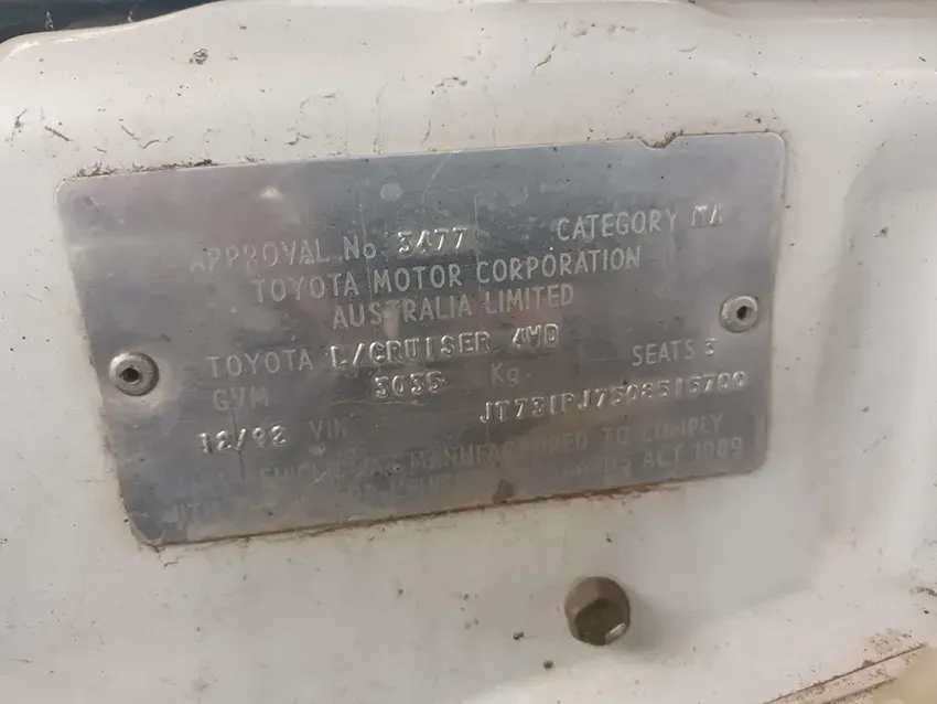 A Close Up of a Toyota License Plate on a White Car — South West 4WD Wreckers In Brisbane, QLD