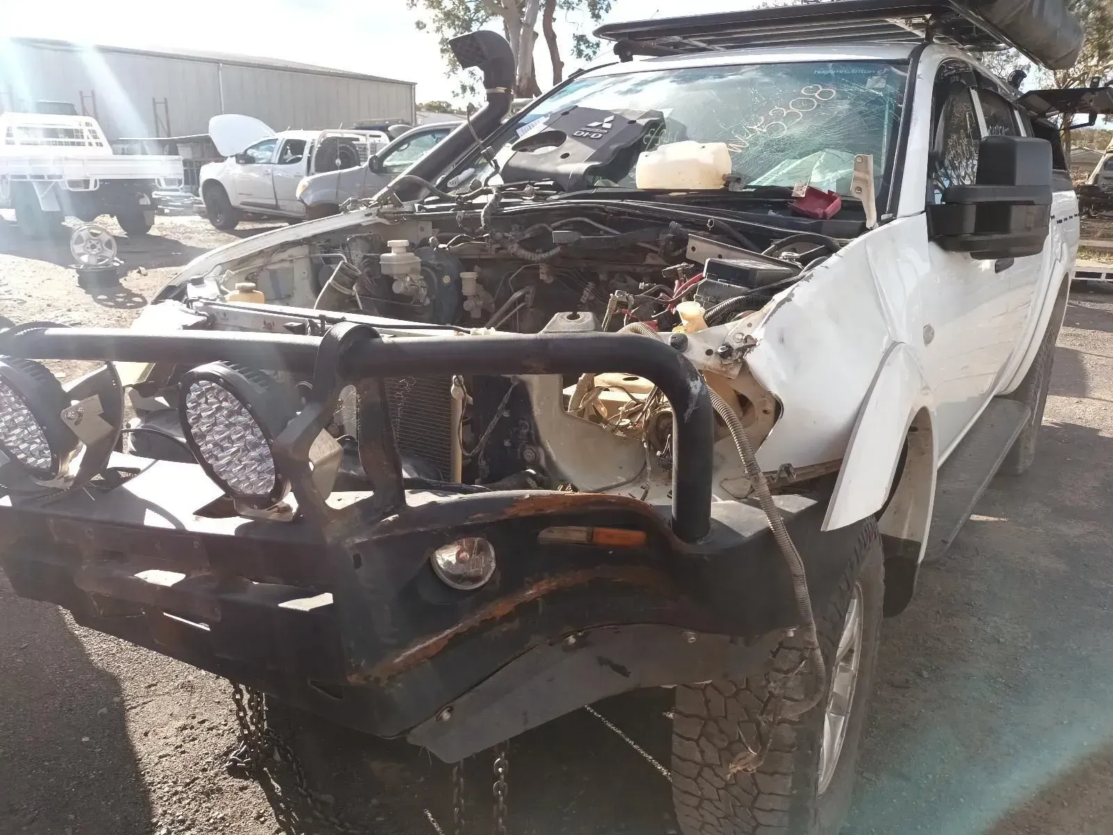 White 4x4 Truck With Front-end Damage — South West 4WD Wreckers In Brisbane, QLD