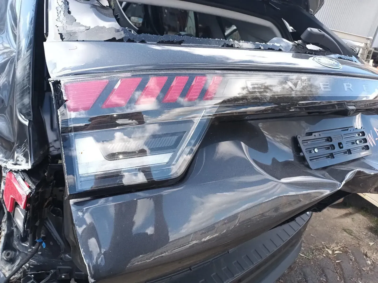 Damaged Black Suv Rear, Dented Body, Broken Taillights — South West 4WD Wreckers In Brisbane, QLD