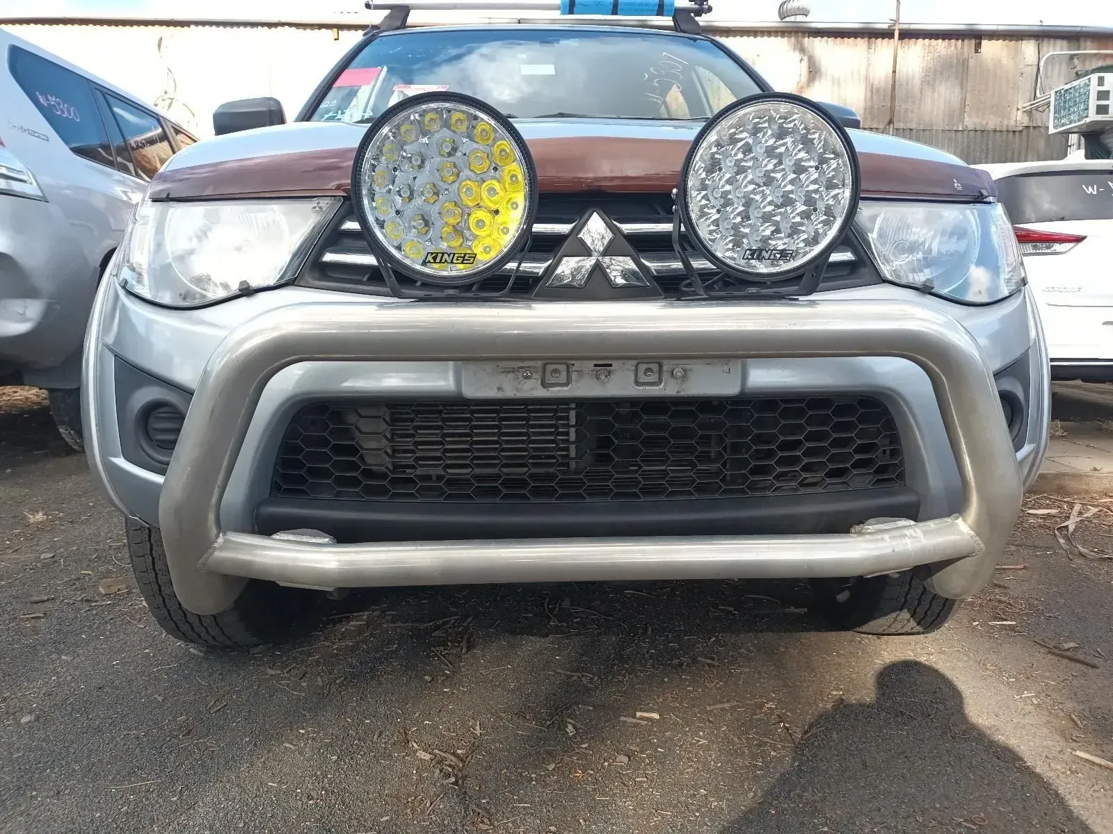 Silver Suv With a Bull Bar and Spotlights Parked Outdoors — South West 4WD Wreckers In Brisbane, QLD