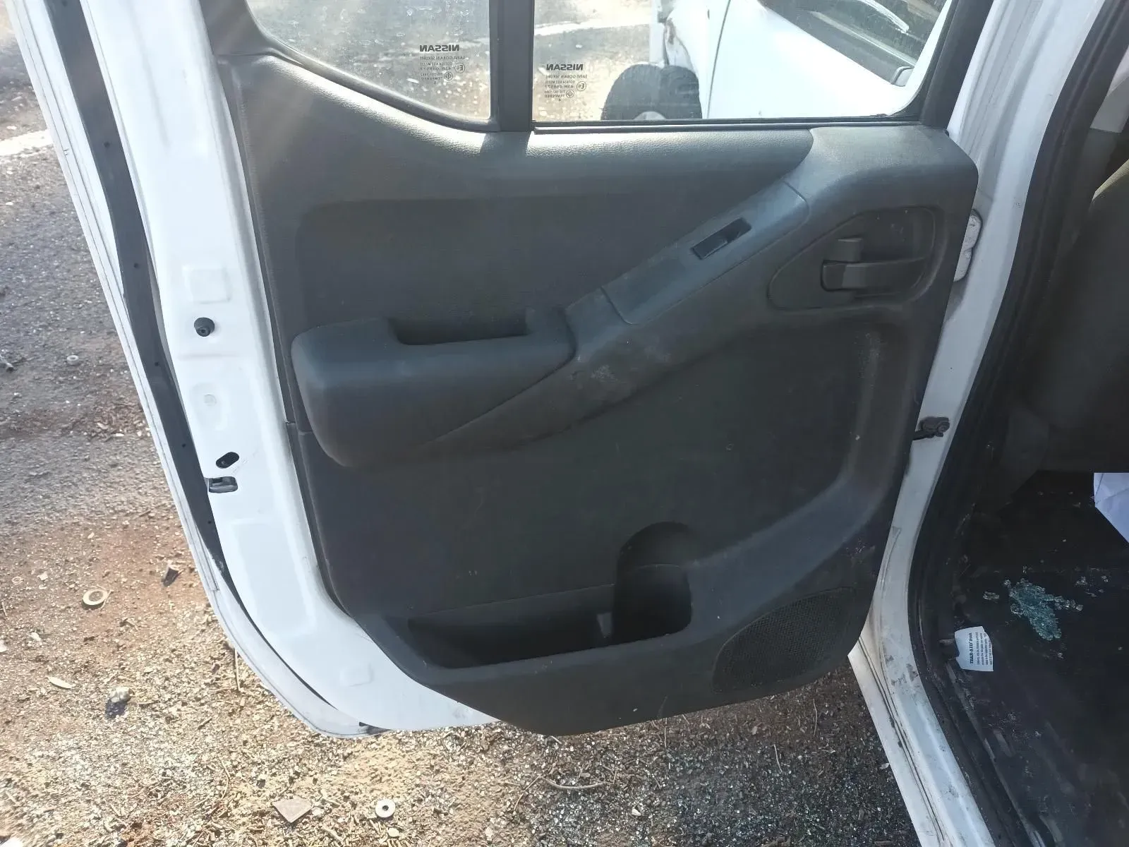 White Car Door Interior With Black Door Panel, Handle, and Window Controls — South West 4WD Wreckers In Brisbane, QLD