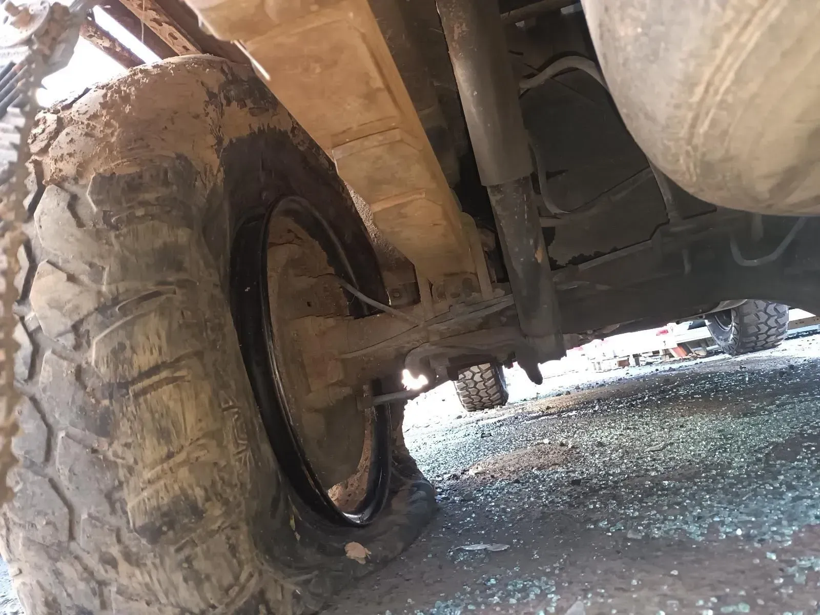 Muddy Tyre and Suspension of a Vehicle — South West 4WD Wreckers In Brisbane, QLD