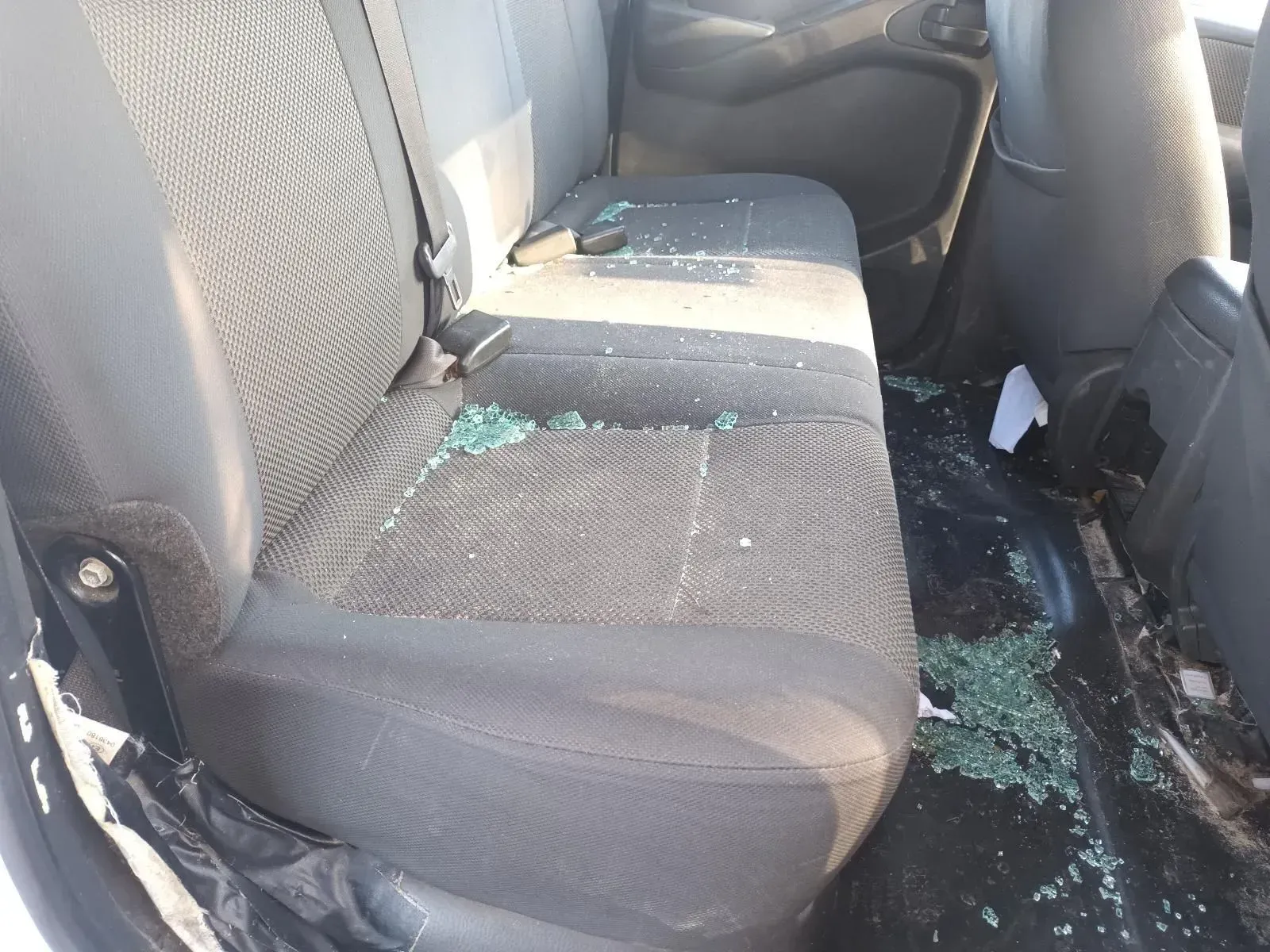 Back Seat of a Vehicle Covered in Shattered Glass — South West 4WD Wreckers In Brisbane, QLD