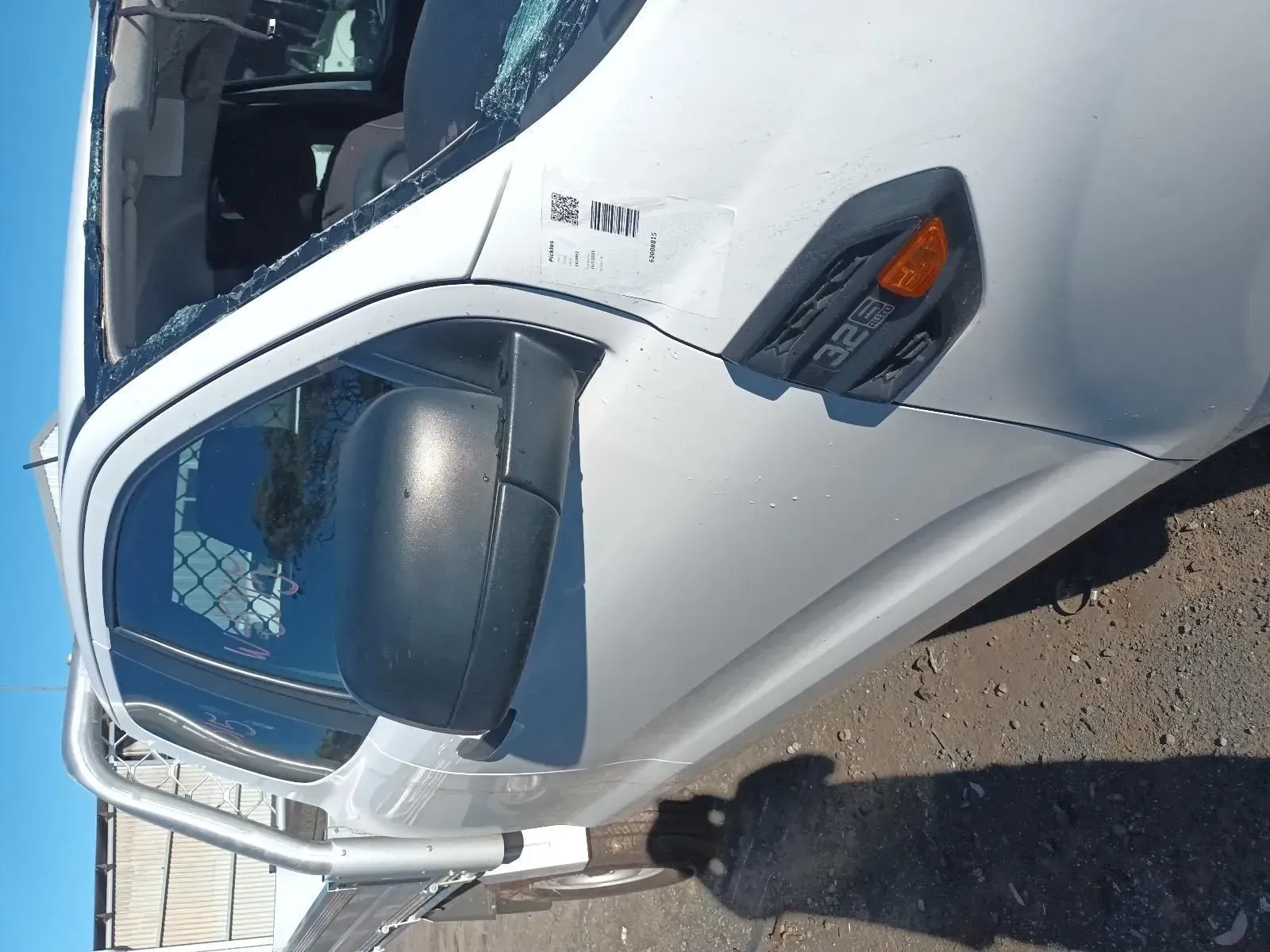 White Truck's Side View With a Side Mirror, Blinker, and Part of the Window — South West 4WD Wreckers In Brisbane, QLD