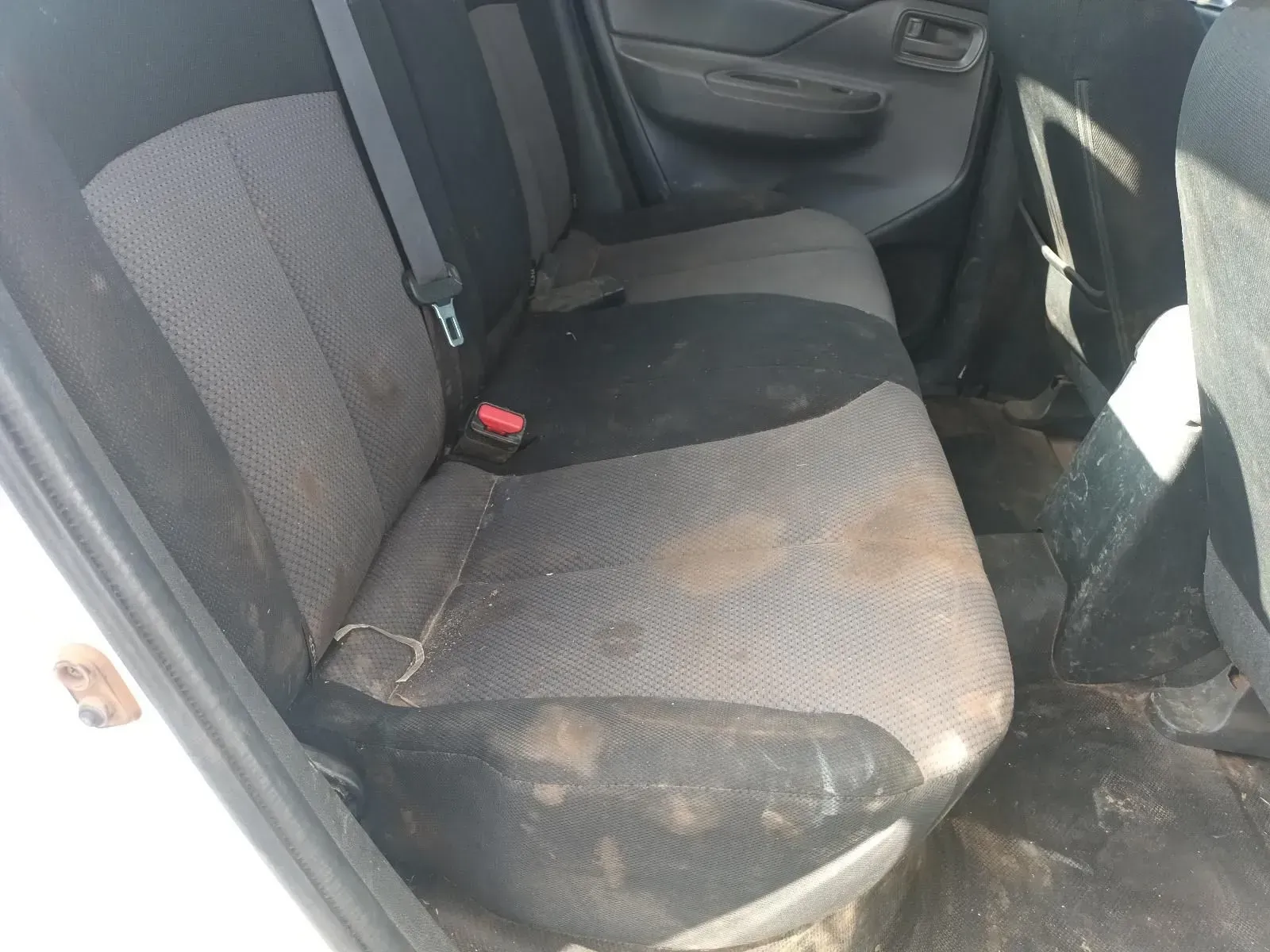 Dirty, Gray and Black Car Back Seat With Visible Dirt and Stains — South West 4WD Wreckers In Brisbane, QLD