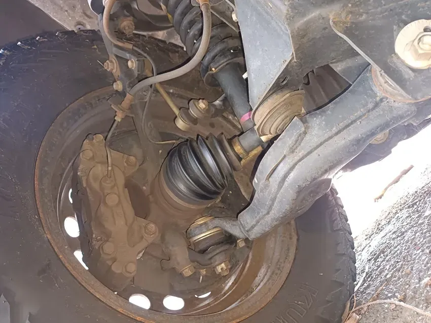 A Close Up of the Front Suspension of a Car — South West 4WD Wreckers In Brisbane, QLD