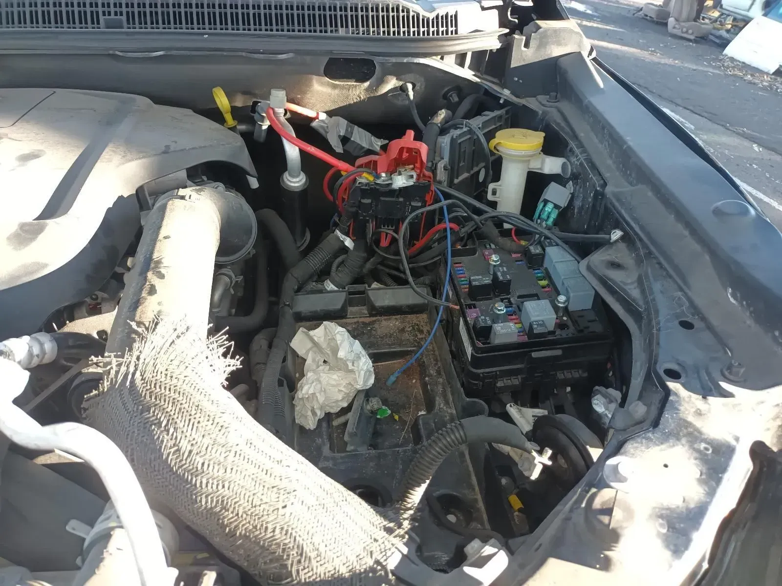 Car Engine Bay, Battery Visible With Red and Black Cables — South West 4WD Wreckers In Brisbane, QLD