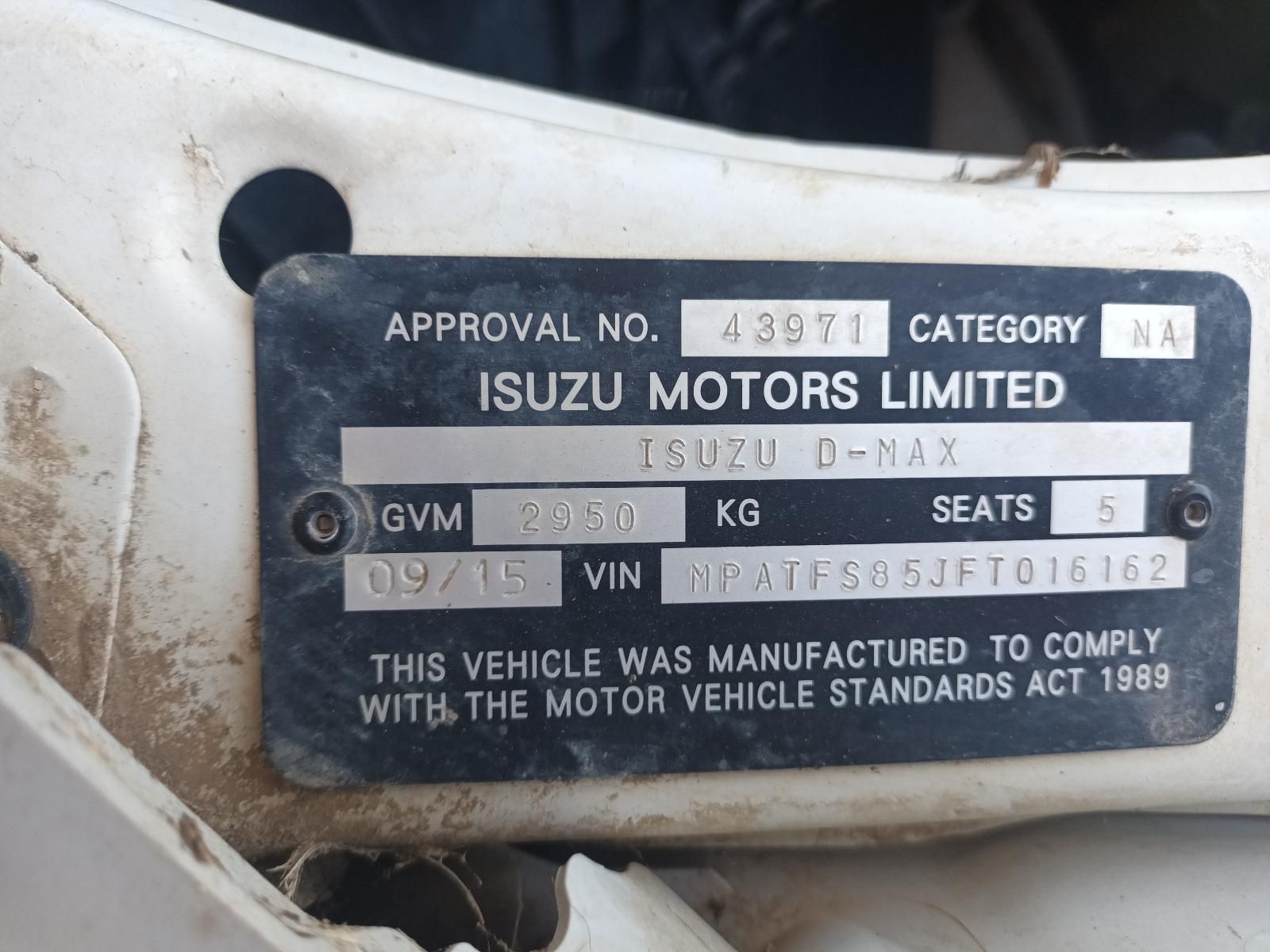 A White Isuzu Motors Limited Vehicle With a License Plate — South West 4WD Wreckers In Brisbane, QLD