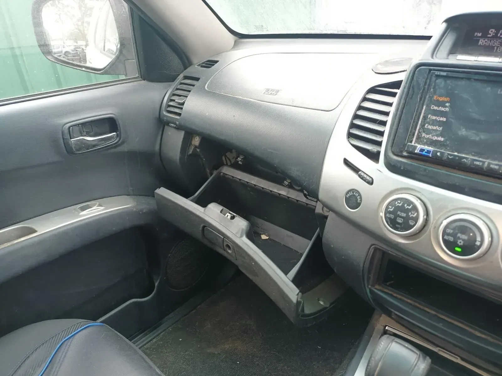 Interior of a Car With Open Glove Compartment — South West 4WD Wreckers In Brisbane, QLD