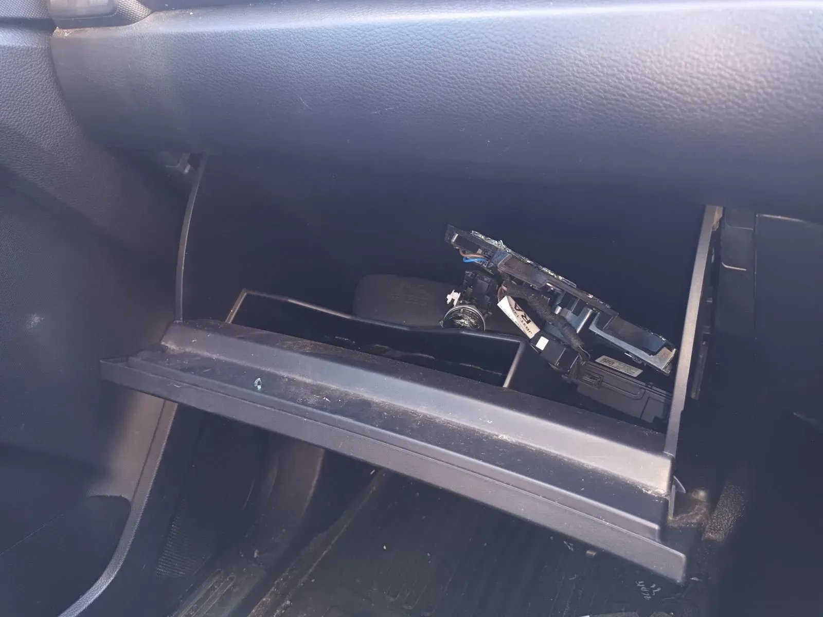 Open Car Glove Compartment With Items Inside — South West 4WD Wreckers In Brisbane, QLD