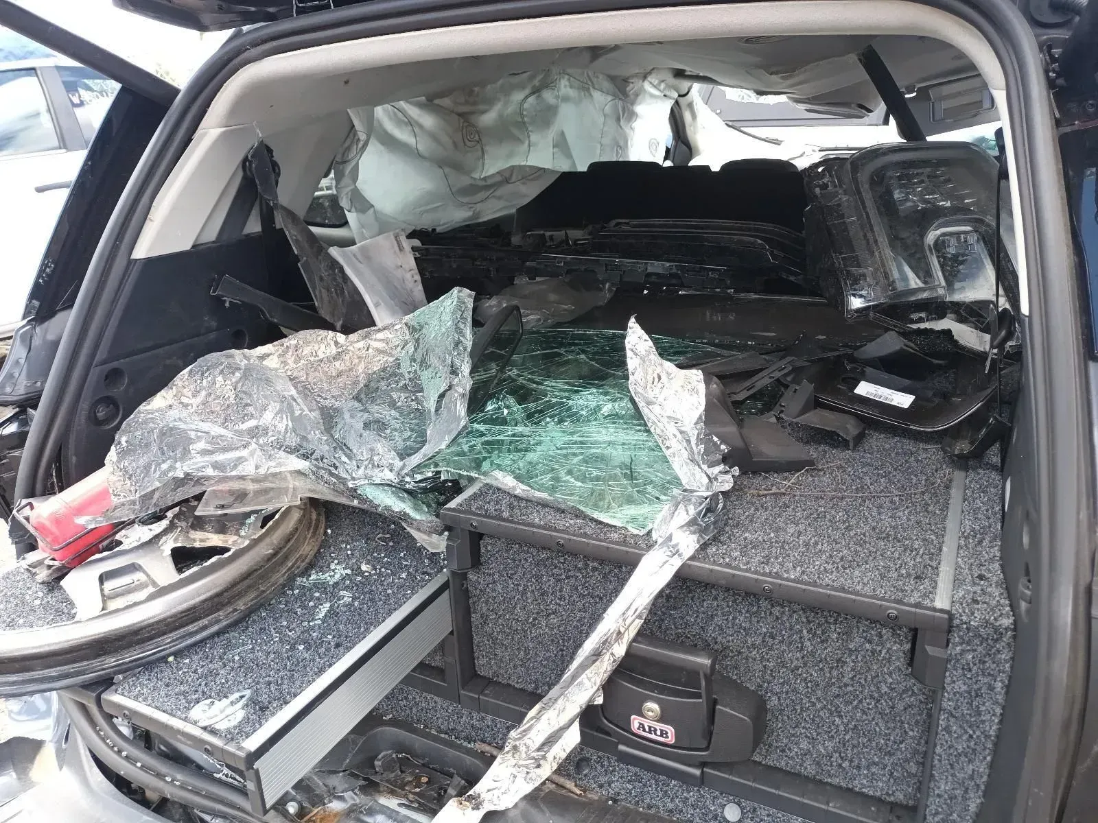 Inside a Vehicle's Rear Cargo Area, Severely Damaged After a Collision — South West 4WD Wreckers In Brisbane, QLD
