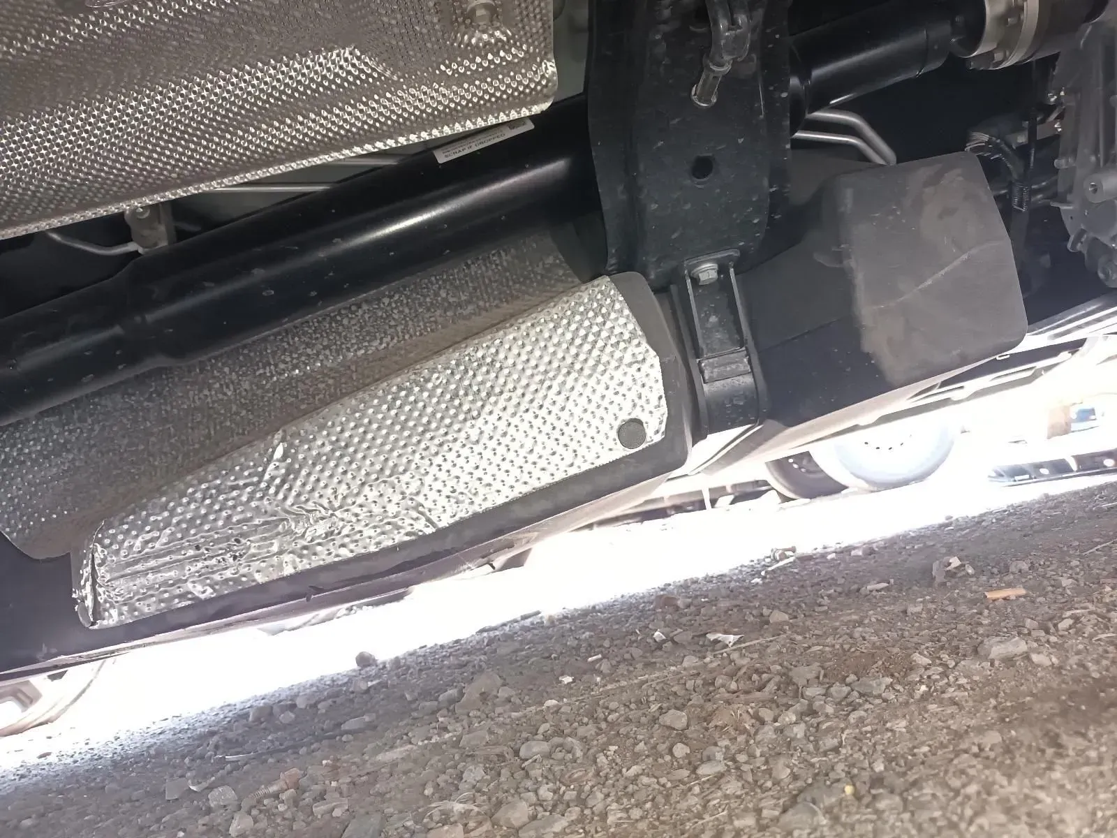 Underside of a Car, Showing a Heat Shield Around an Exhaust Component — South West 4WD Wreckers In Brisbane, QLD
