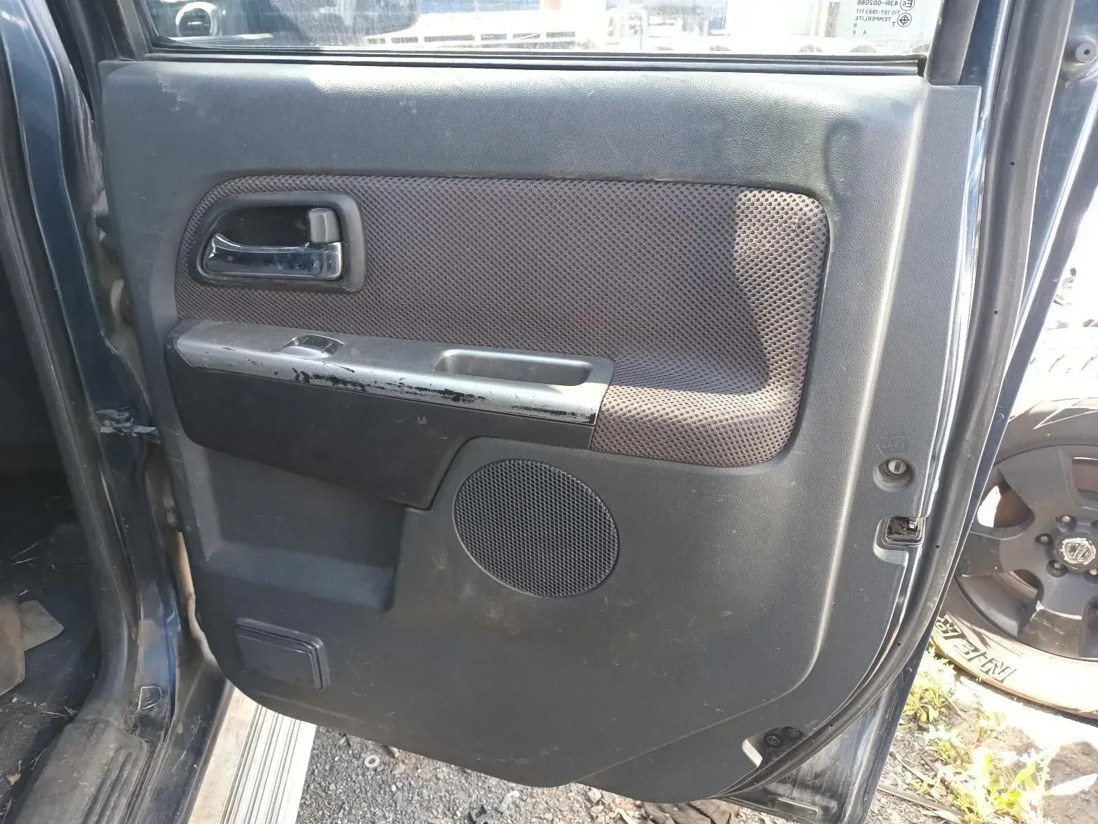 Car Door Panel. Black With Fabric Insert, Speaker, and Handle — South West 4WD Wreckers In Brisbane, QLD