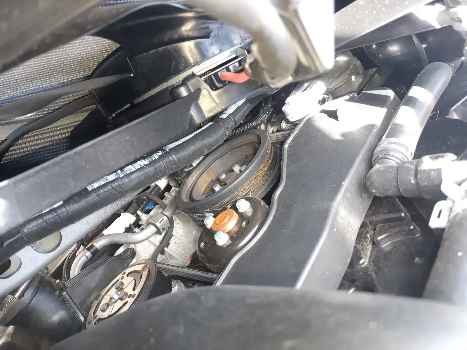 Overhead View of a Car Engine With Belts, Pulleys, Wires, and Hoses Visible — South West 4WD Wreckers In Brisbane, QLD